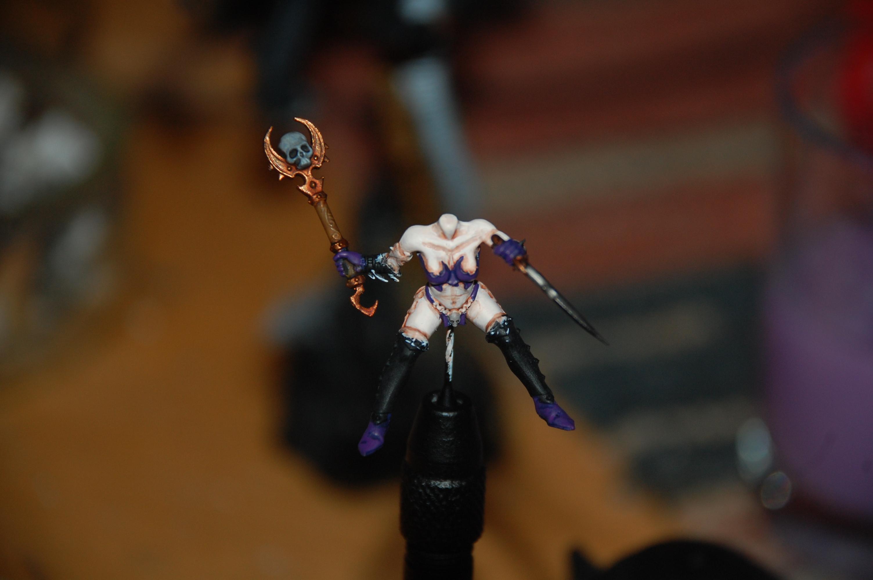 Some more work on the clothes this time with a layer of VGC Hexxed lichen