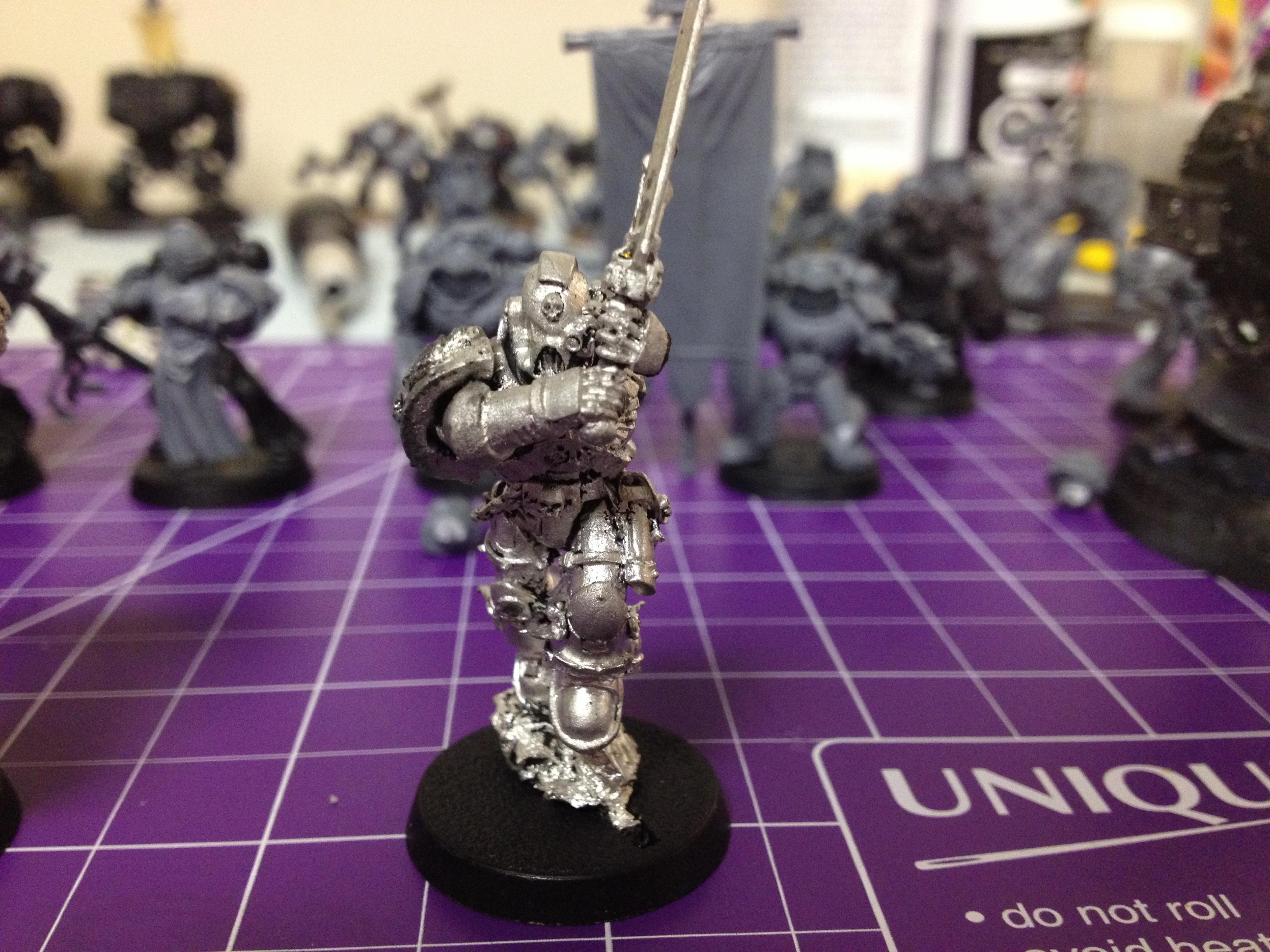 Here's my Assault Sergeant. As you can see I got a fair amount of paint off. I probably spent a good 2-3 hours with a metal pick after brushing did what it could for the three metal models