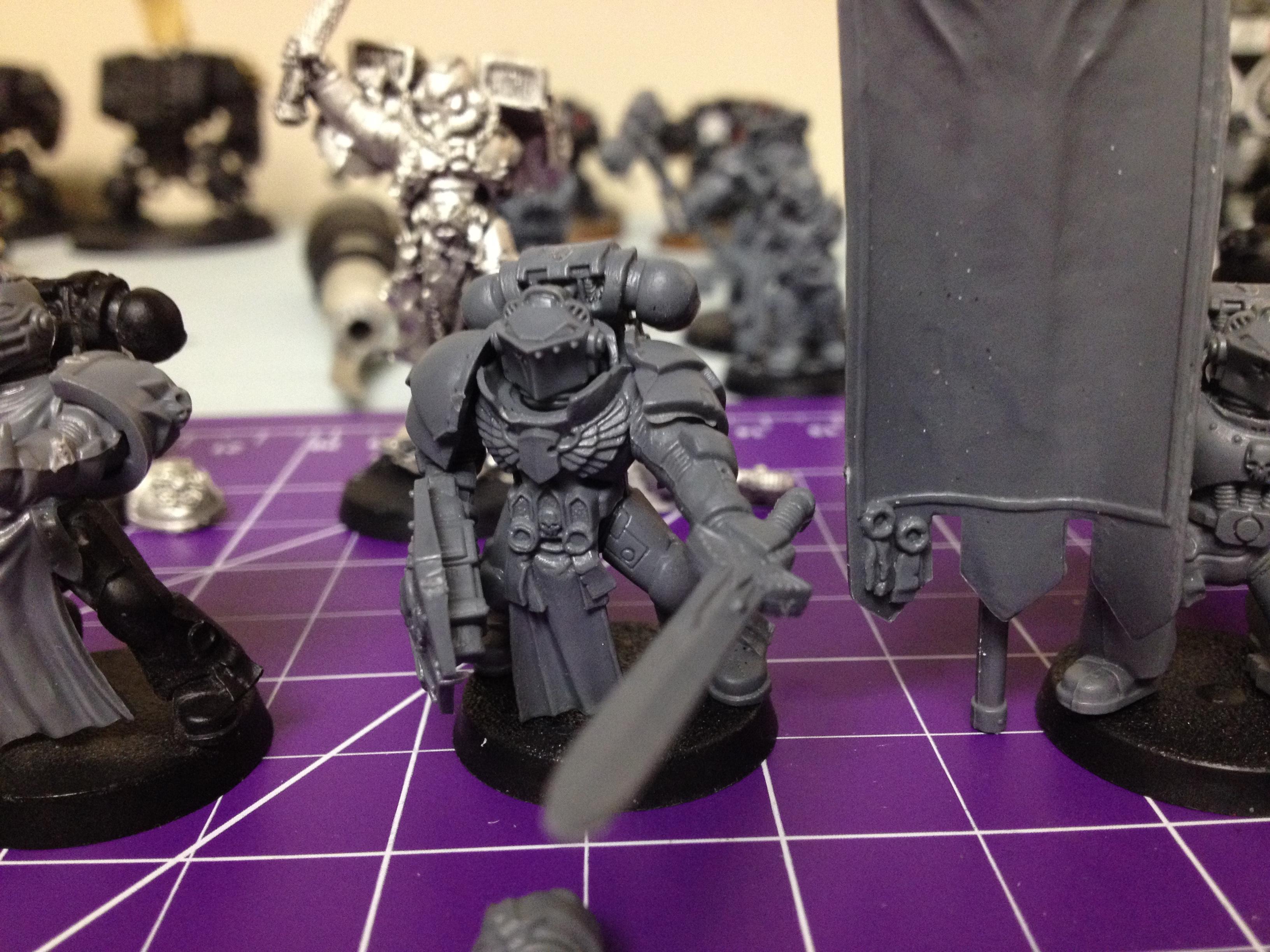 This is the regular company champion with just a Grey Knight head, I feel the Grey Knight heads look a lot more templarish. I might bitz shop a bunch of heads and theme the army like that