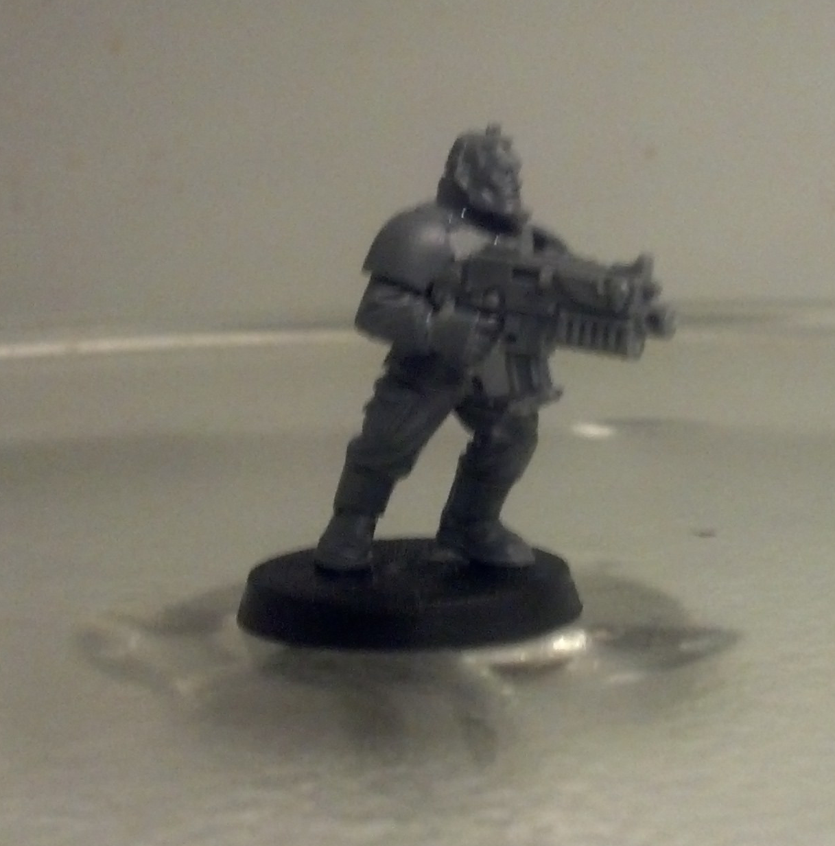 Simple, used a scout head and a set of grenade launcher arms. The launhcer itself is cut off at the wrist and a new tactical marine bolter fits in the same spot. 