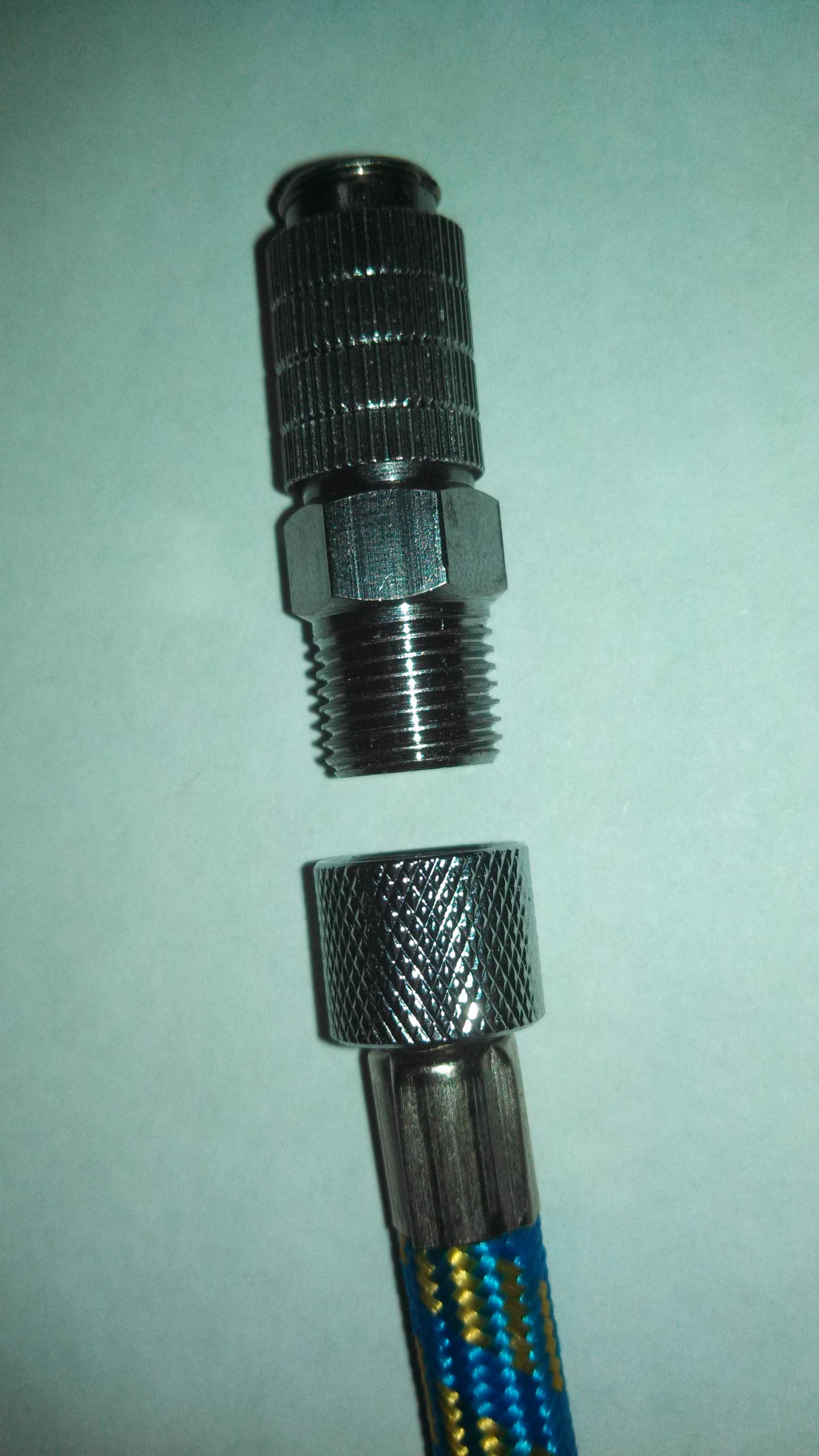 This is the 1/8 BSP fitting and it easily screws into the airbrush hose