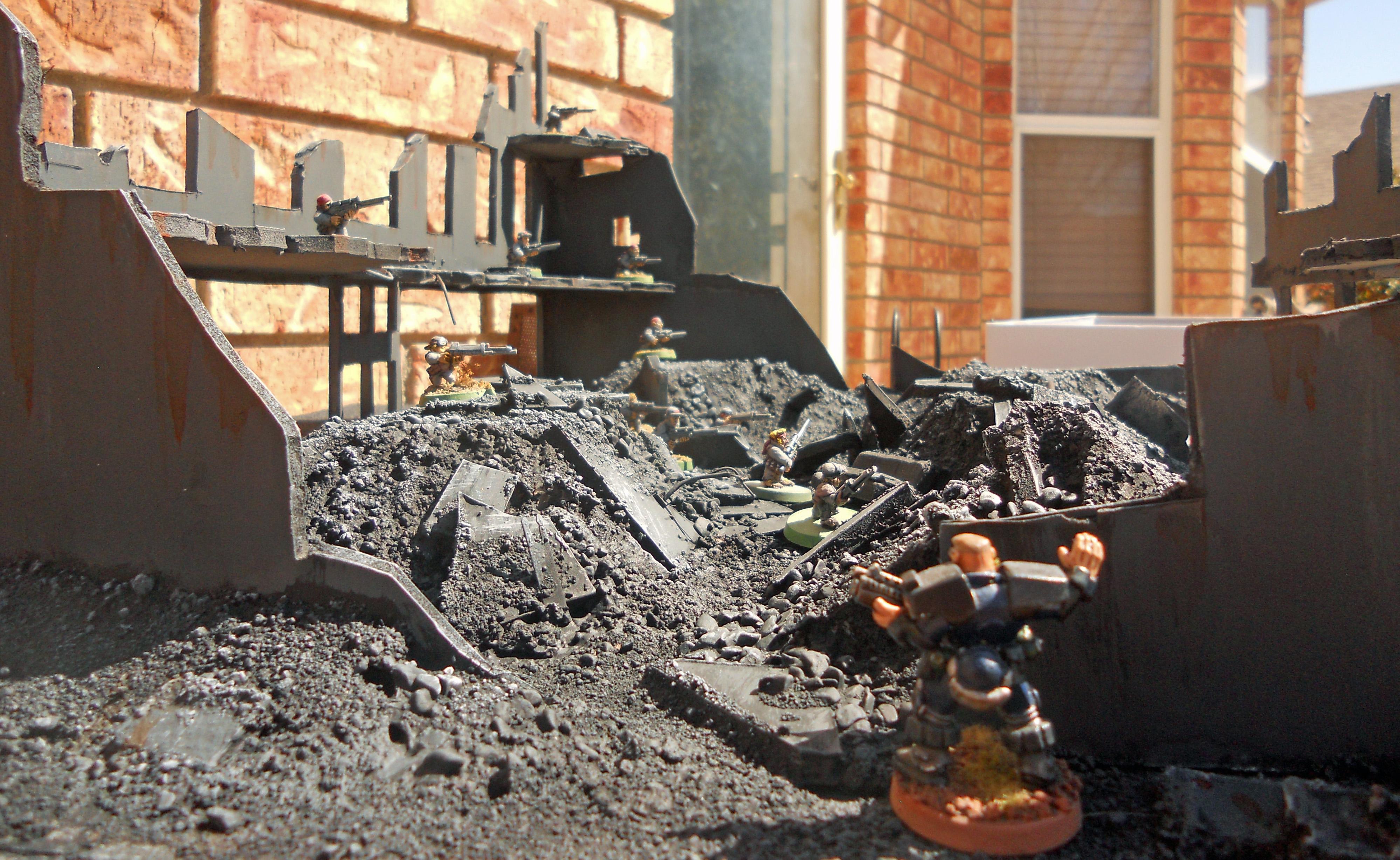 Guard, rubble scene