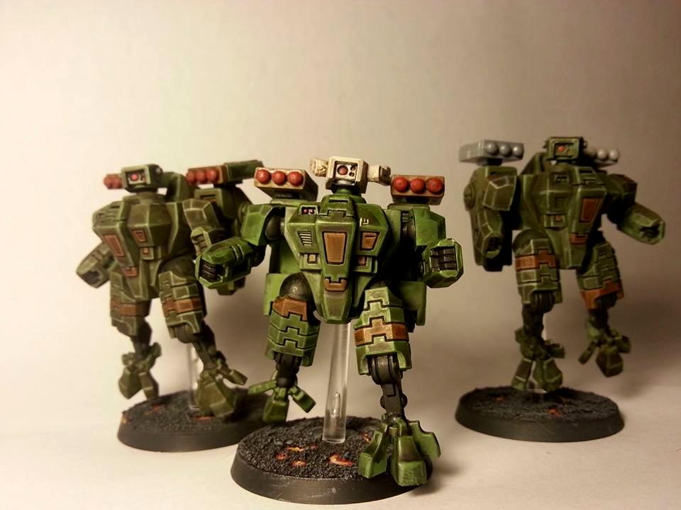 tau crisis suits