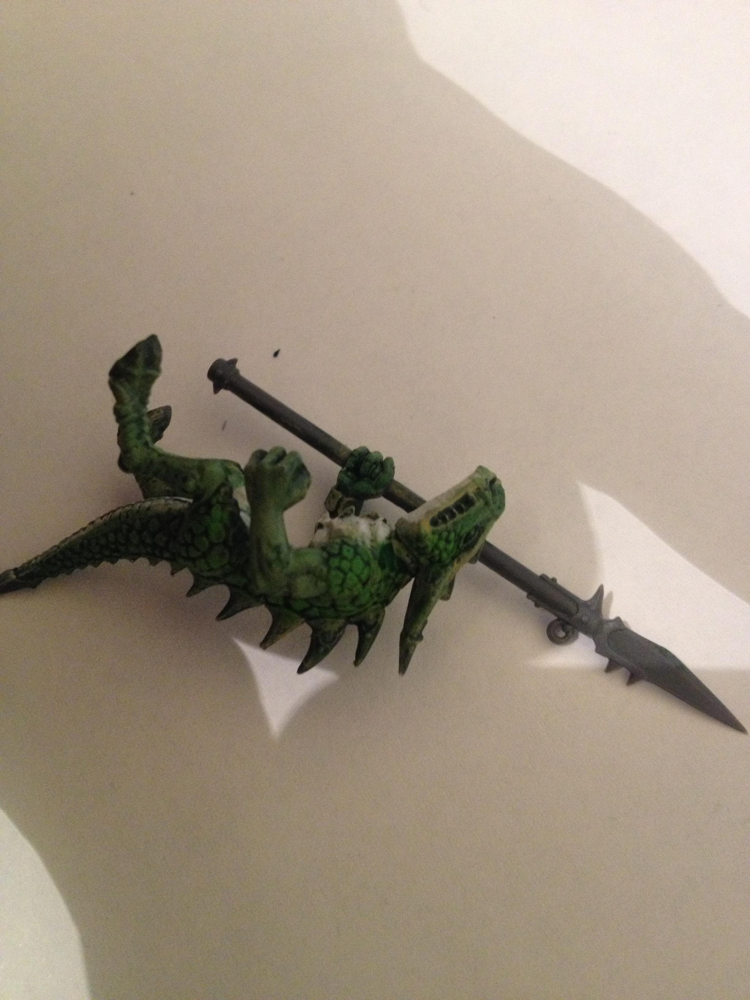 very lightly went in and "cleaned up" the skin area on arms, head crest and legs with skarskink green