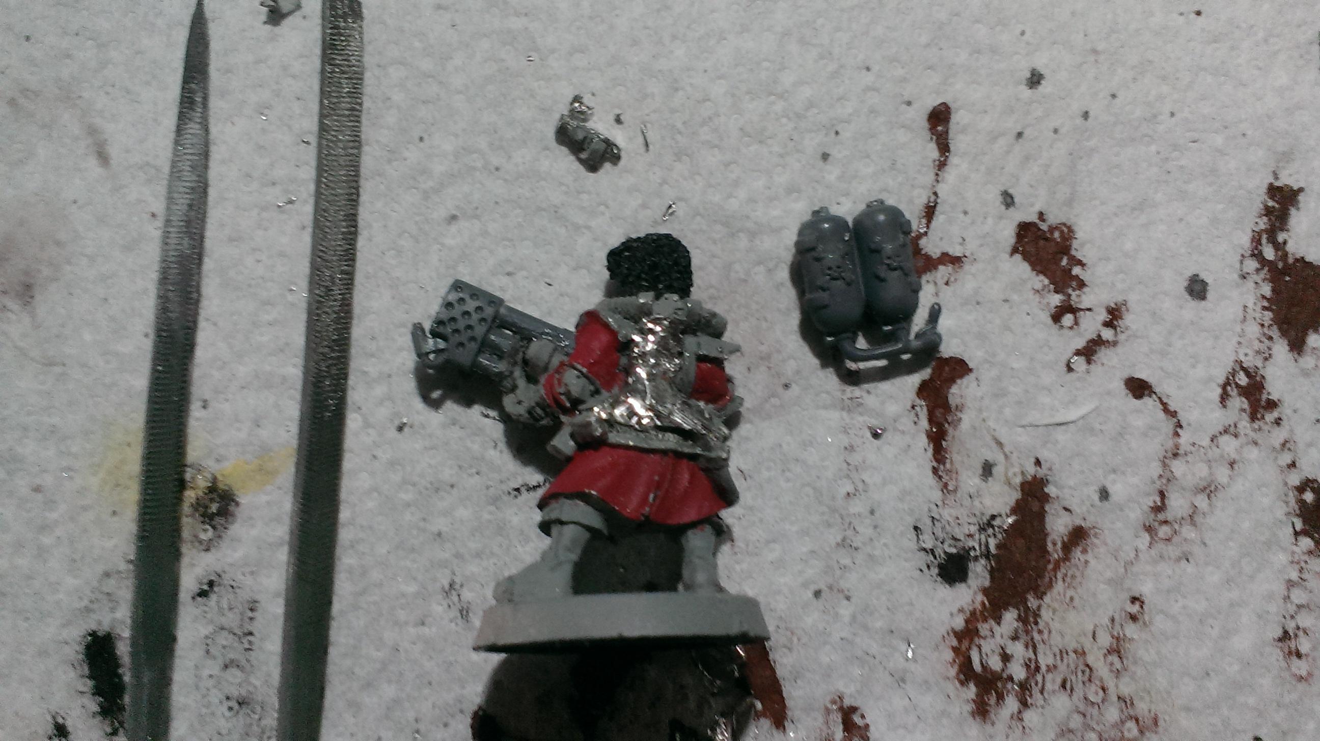 Using files and patience, remove the gear from the back of the model. (Obviously this step is optional, I just feel a heavy flamer will need a bigger tank than the normal flamers)