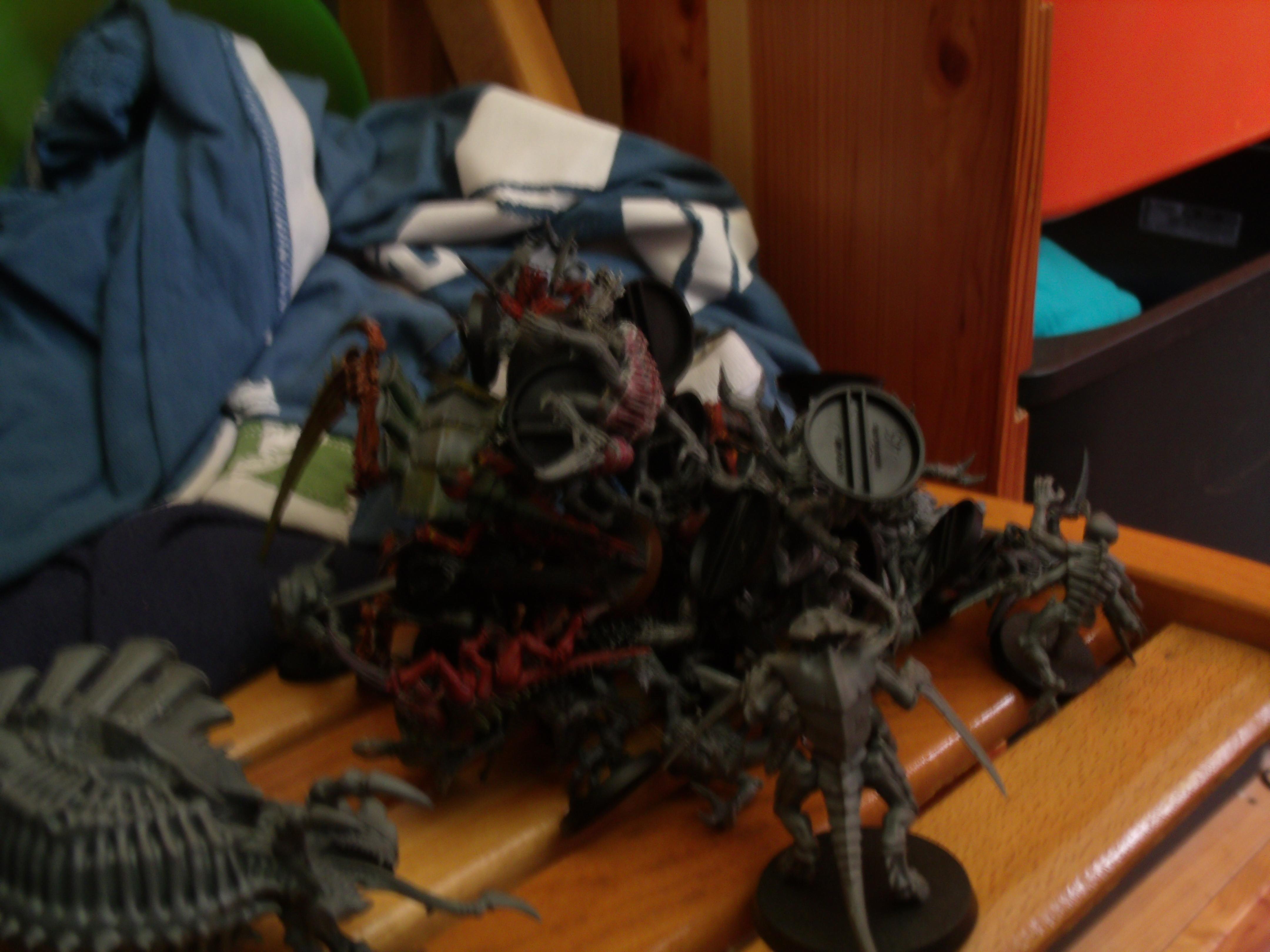 my little brothers death pile (theres a carnifex under there somwhere :O)