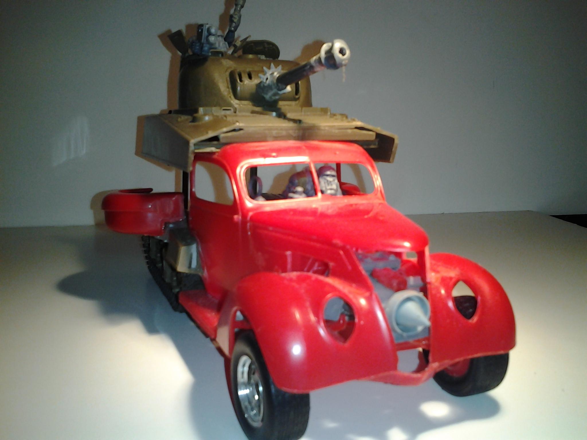 my favorite! a '37 ford sedan and a sherman tank had a baby..