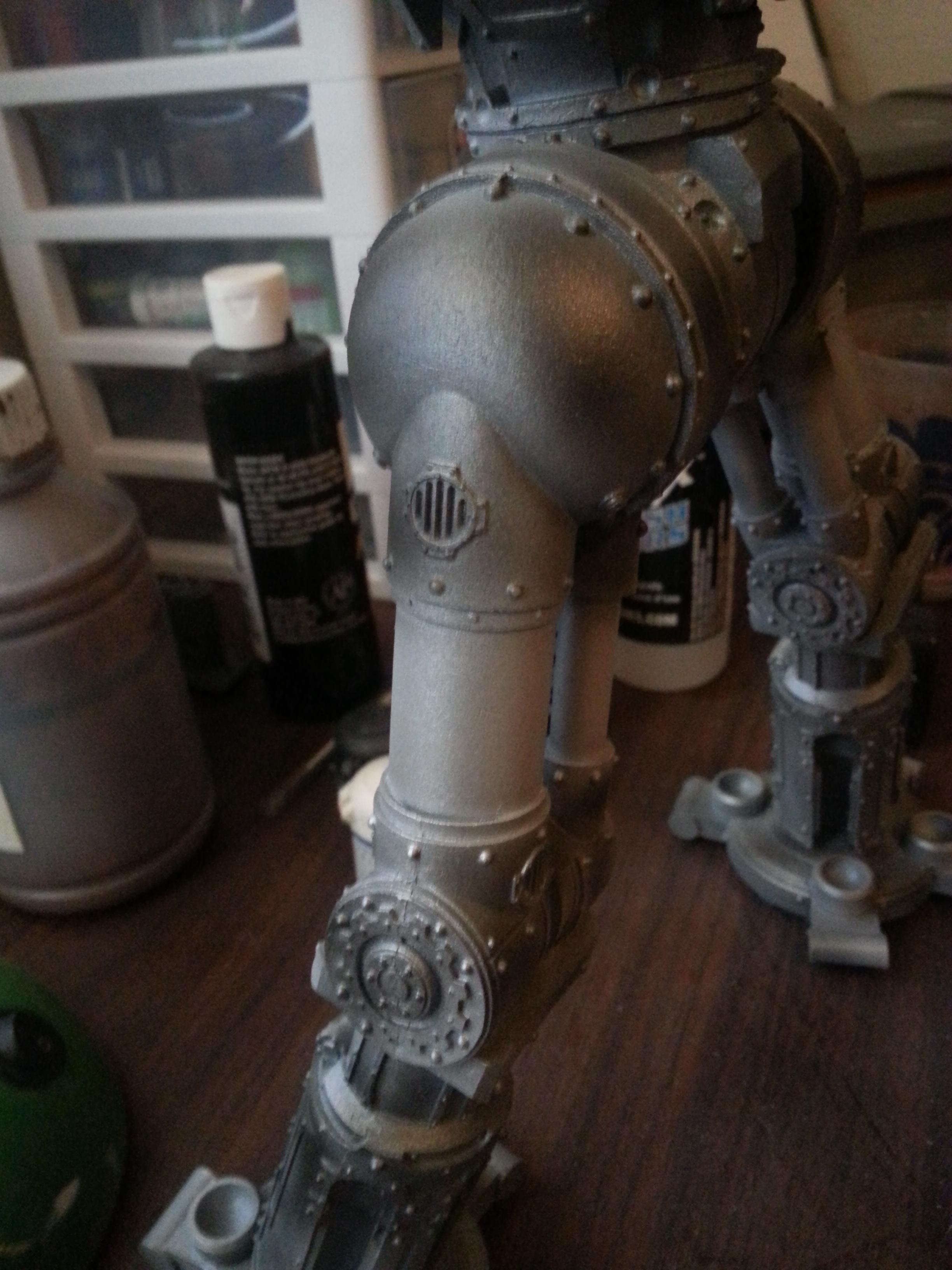 This is the right hip socket of the model - here I used gunmetal minitaire and then a layer of createx transparent black paint.  This will later be highlighted by hitting the rivets with a brighter silver