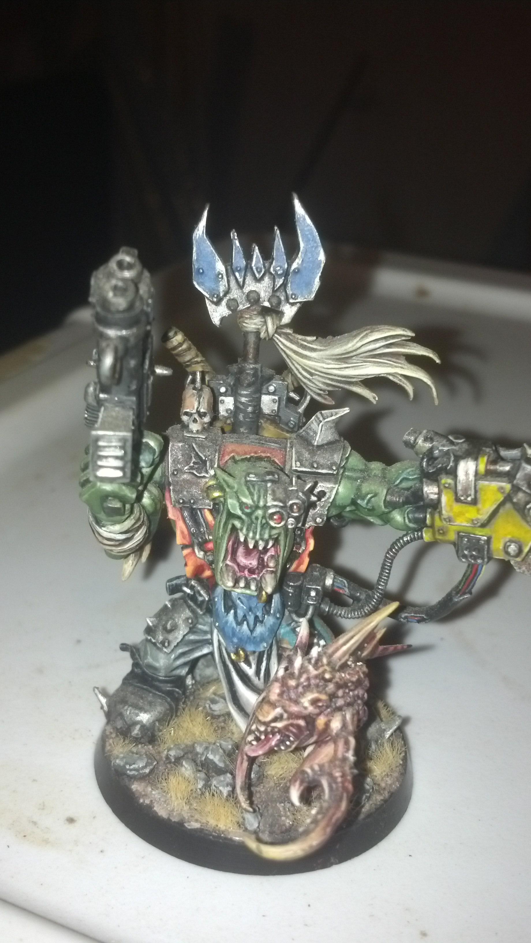 the black reach warboss. i built the attack squig out of some bitz in the store's bitz box