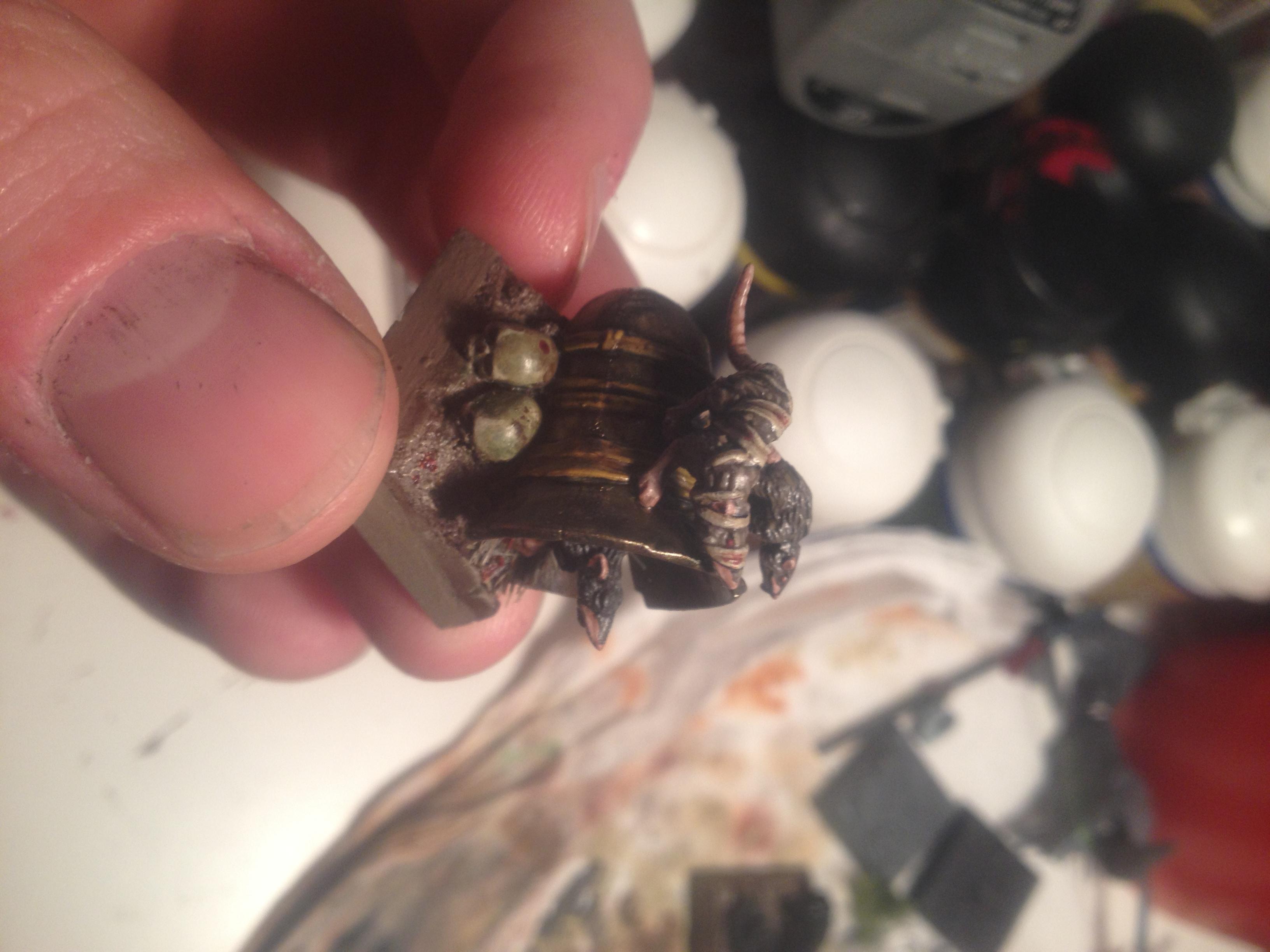 Conversion, Skaven, My favorite yet. Mini dingy bell. Typhus Corrosion has been great on this project. The bandaged rat's head was removed and repositioned at a slight angle to add more suggestion of variety and slinking movement