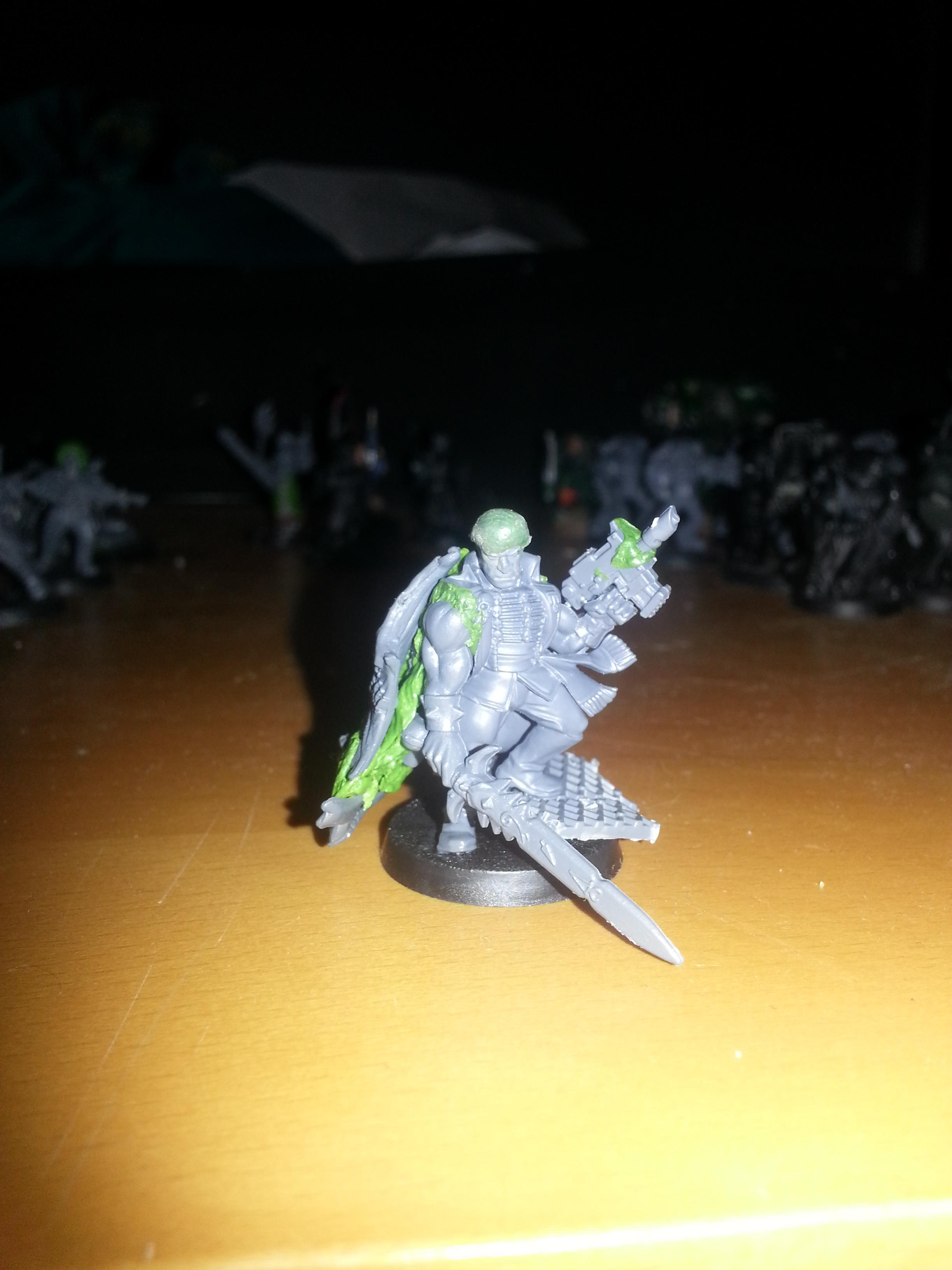 Priest with autogun / Commissar with power weapon and bolt pistol