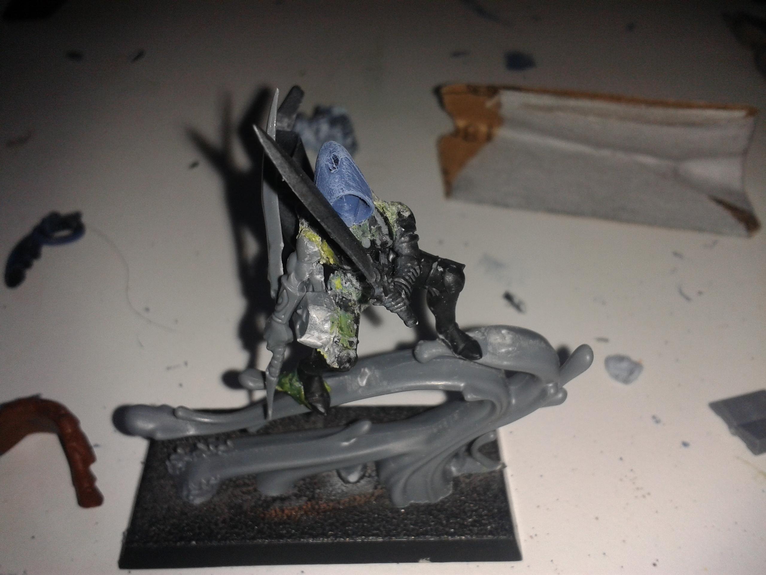 Unpainted assassin. Made from some wood elf, dark elf and dark eldar parts