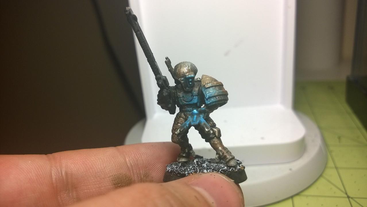 My first Tau Firewarrior in rusty armor