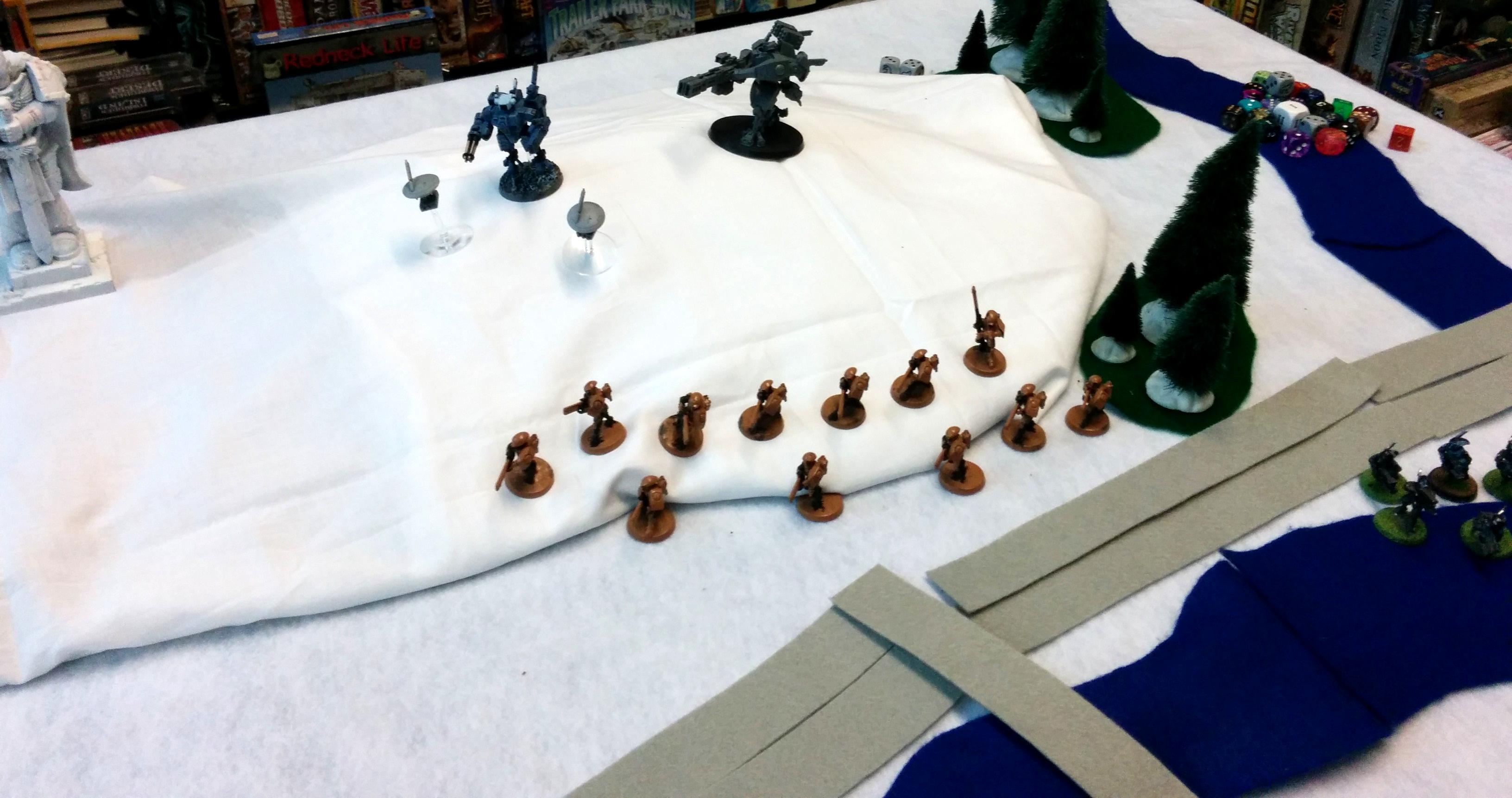 Orks, Tau, Close up of Fire Warrior and Broadside deployment