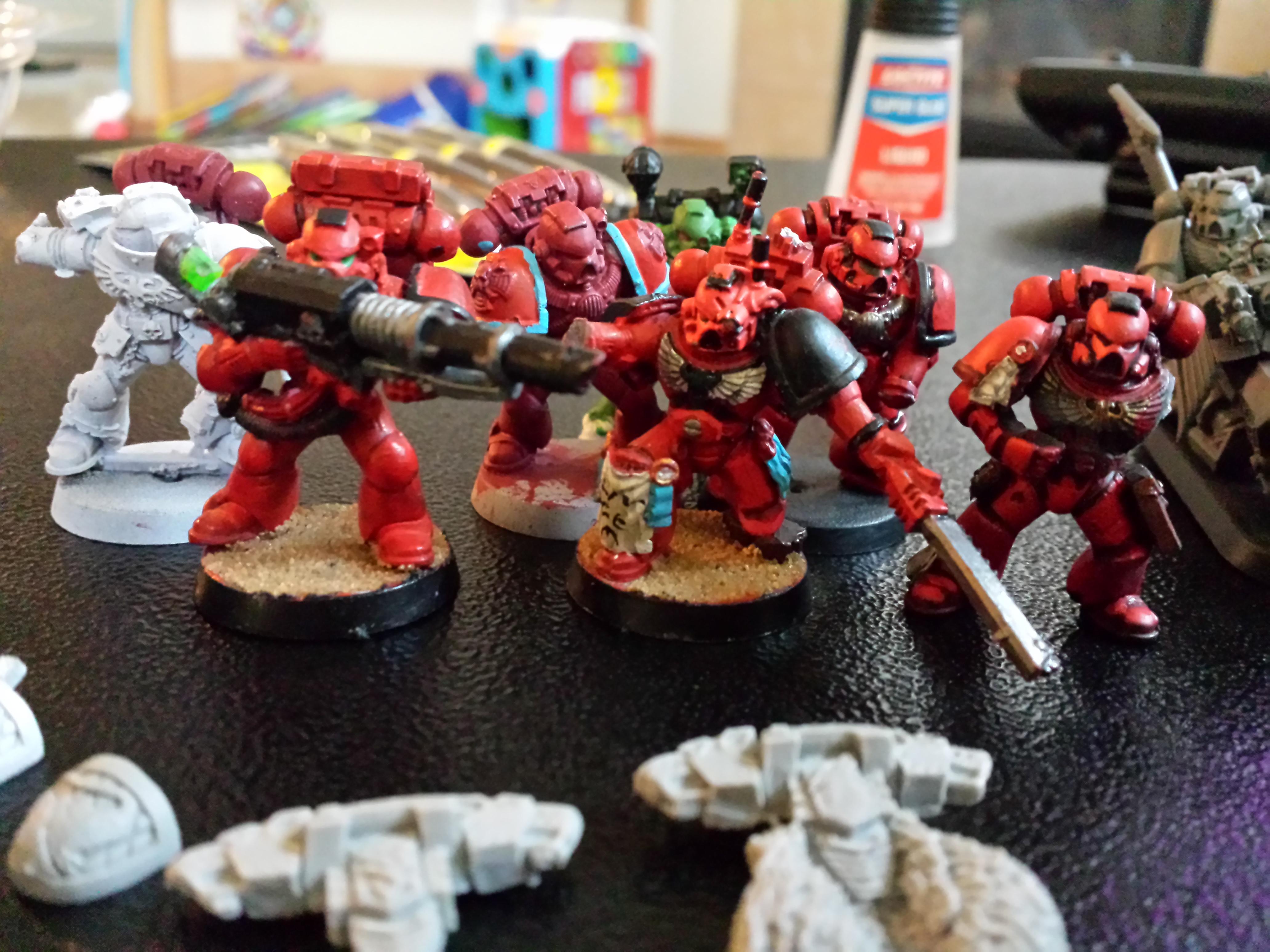 Close up of the scavenged marines (who are currently bathing in cleaner)