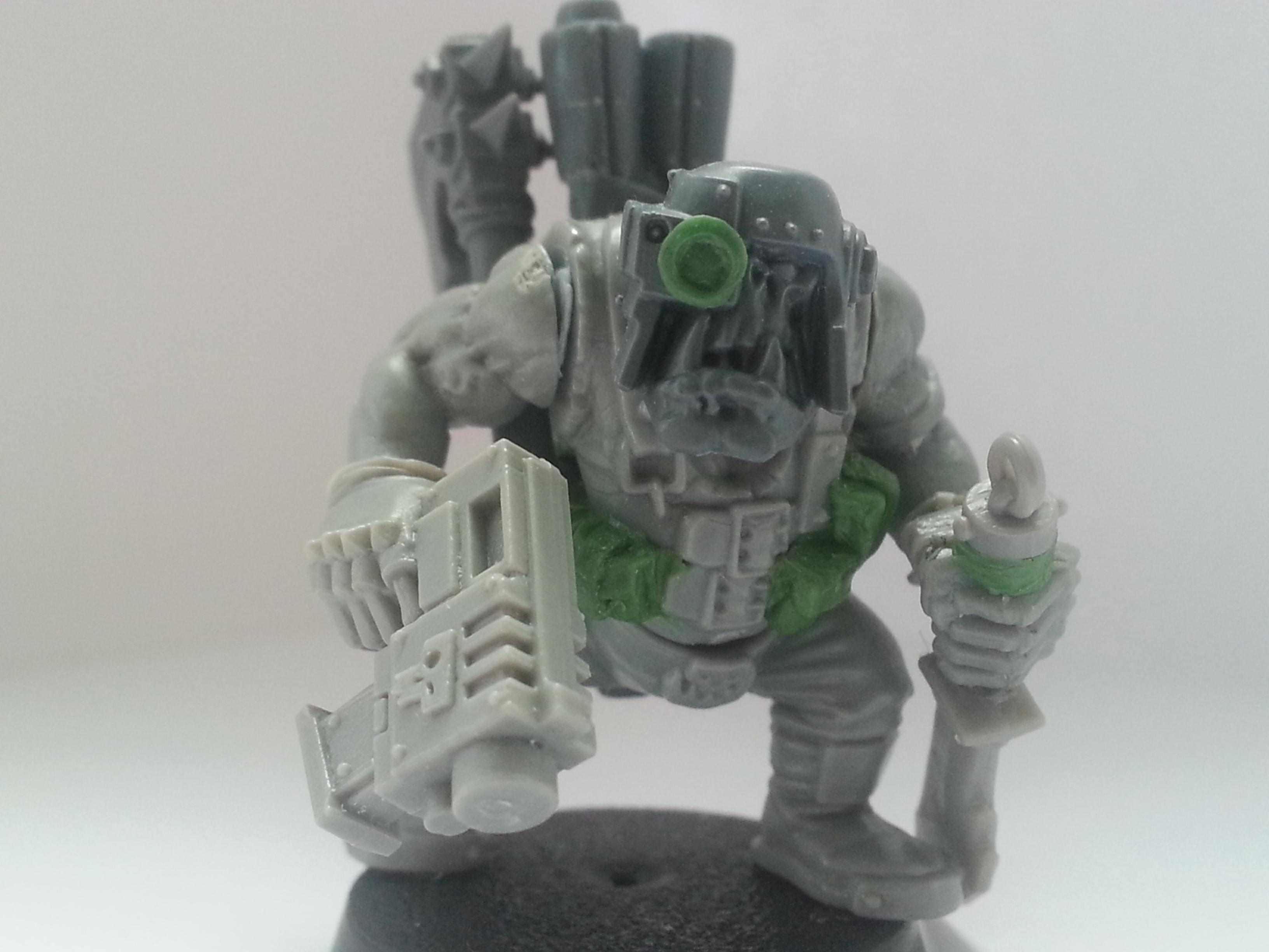 mpre goggles!  as with a few of the other boyz I sculpted extra pouches to his front to try and 'beef' him up a bit