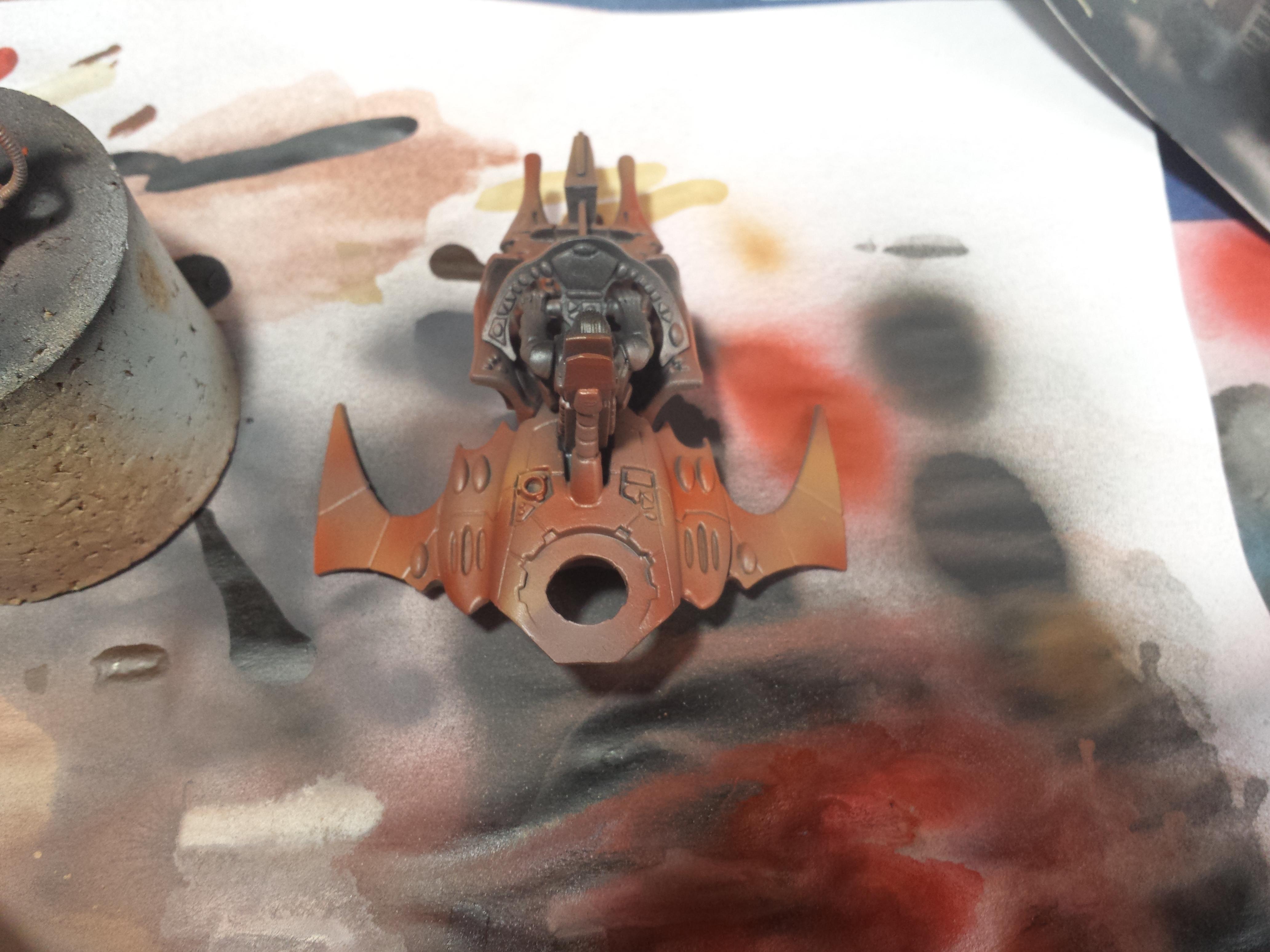 2. After priming the model i applied a layer of VMA rust , fiery red and us brown in random places . this is to give you variation in in the weathered effect when you start to remove paint