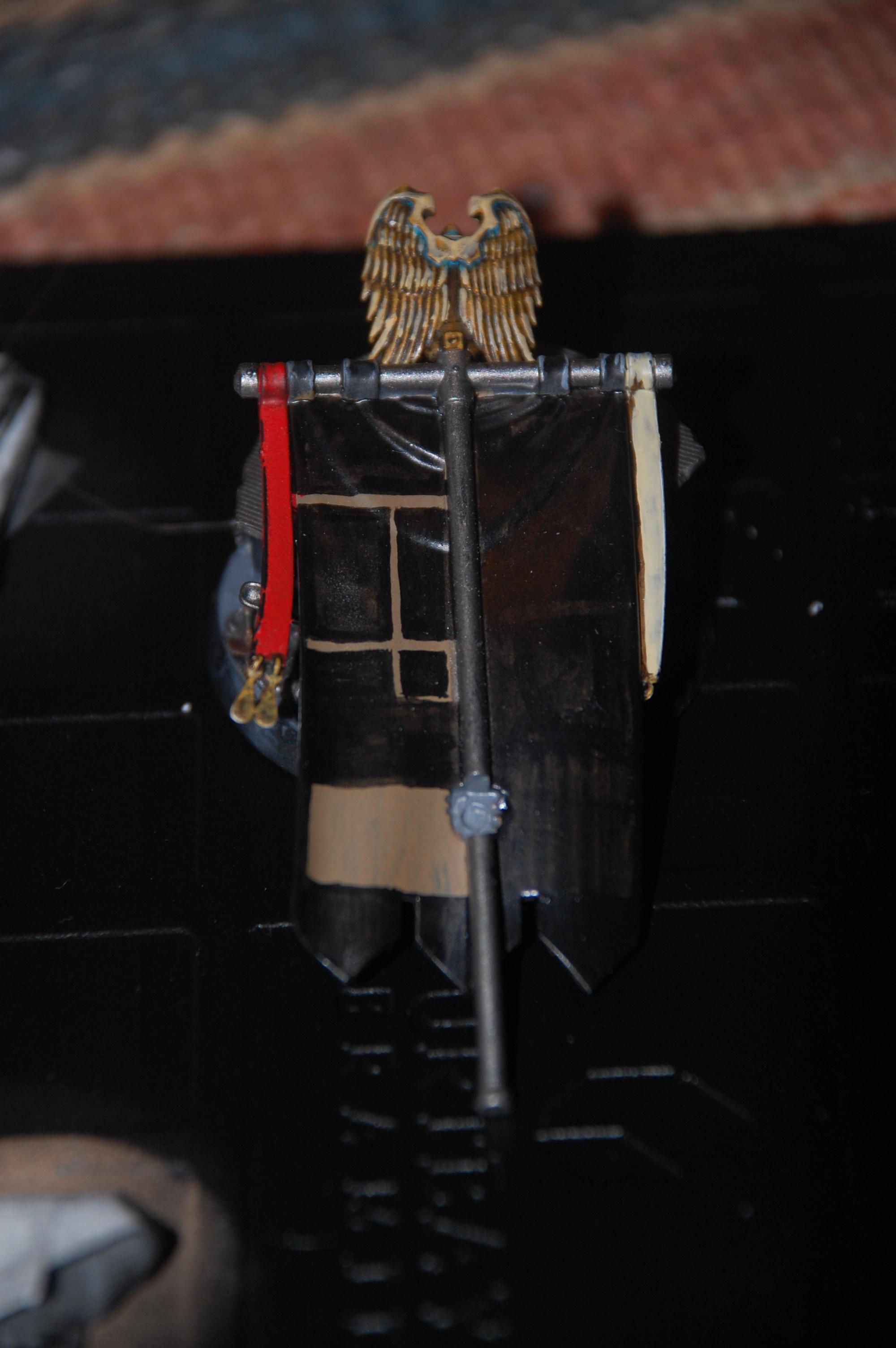 Also doing some freehanding to the back of the banner 