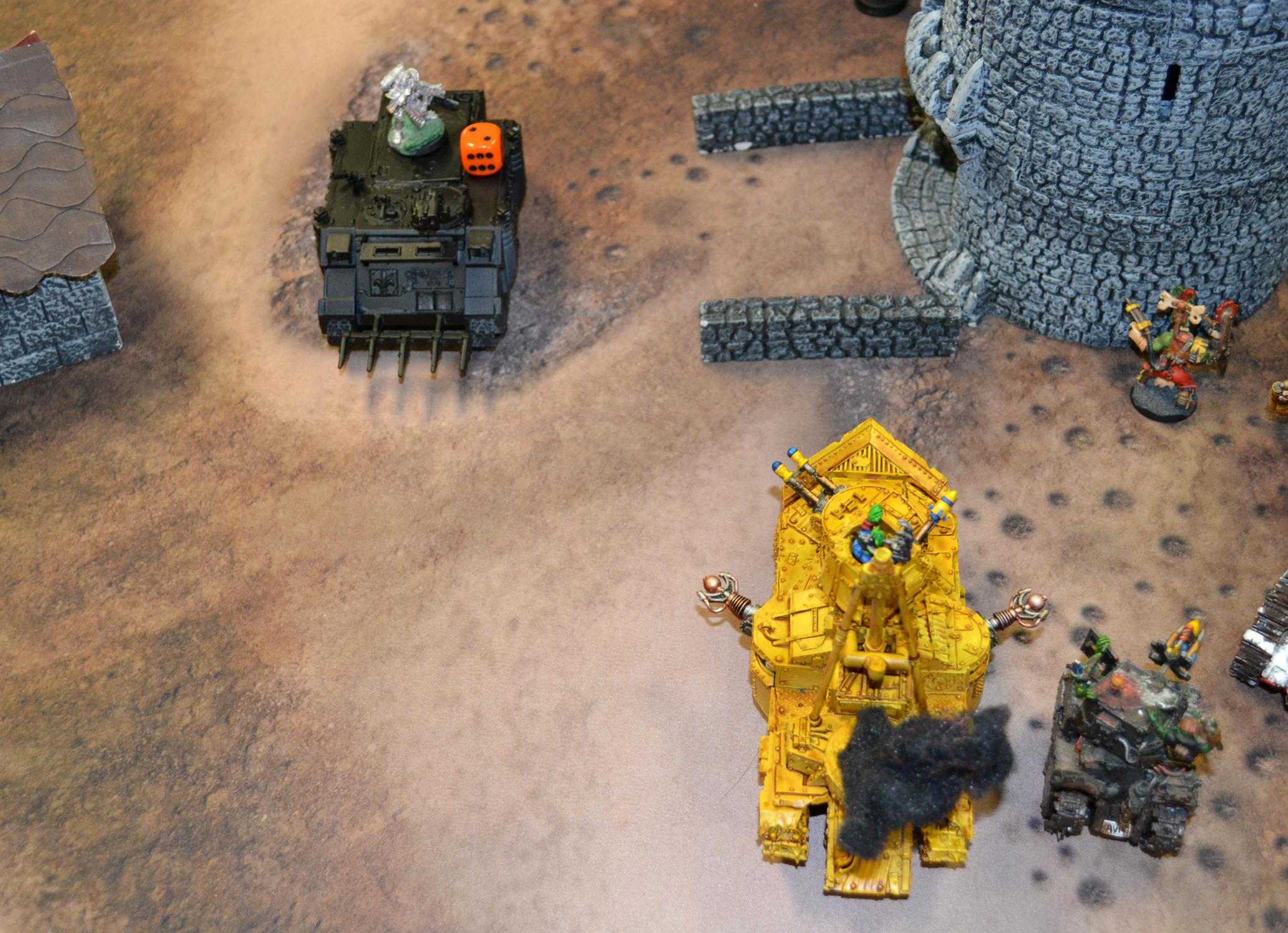 20 Orks T4 megatank scores a hit on rhino