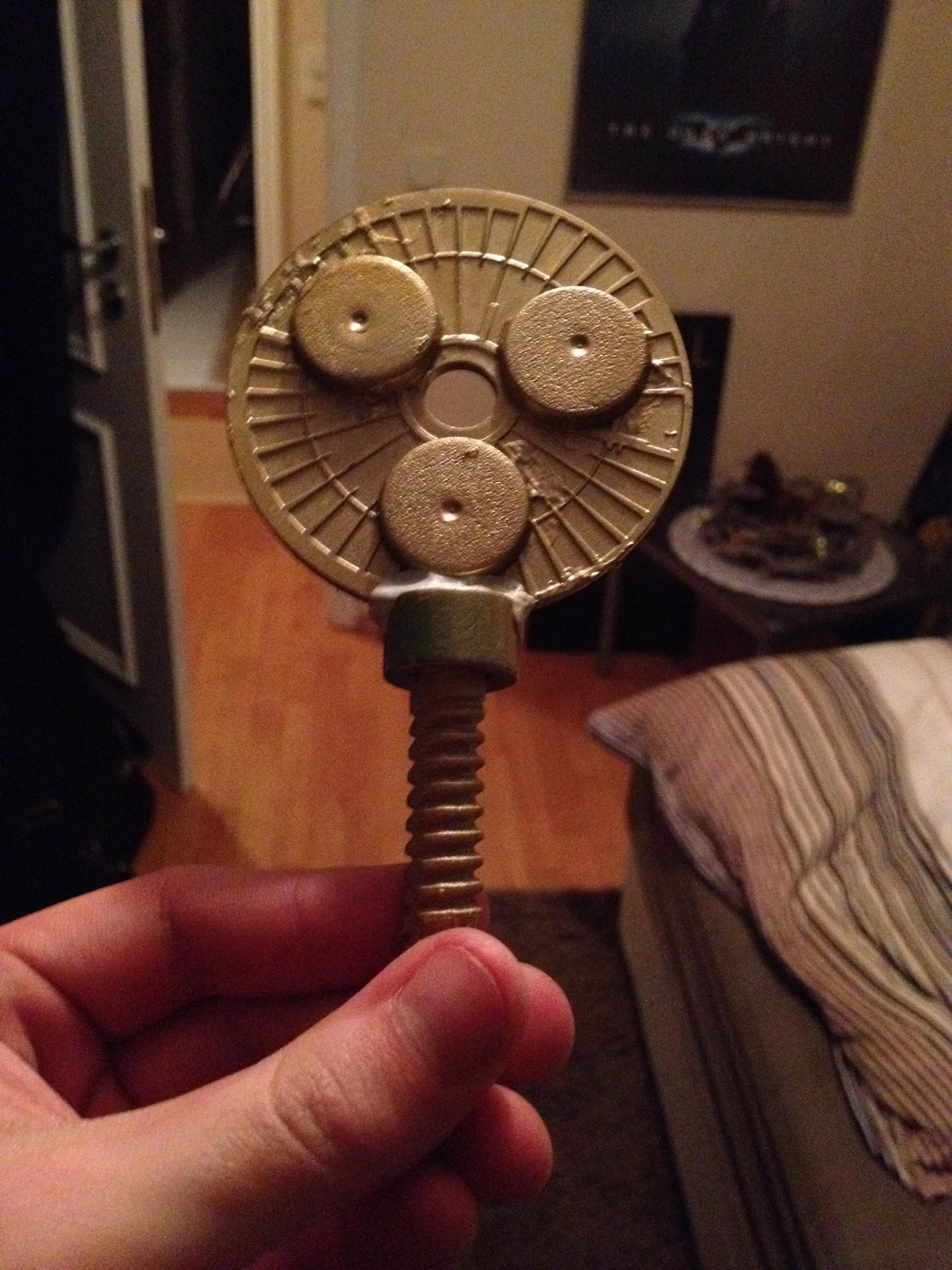 The demon will carry this in his right hand as a scepter. 