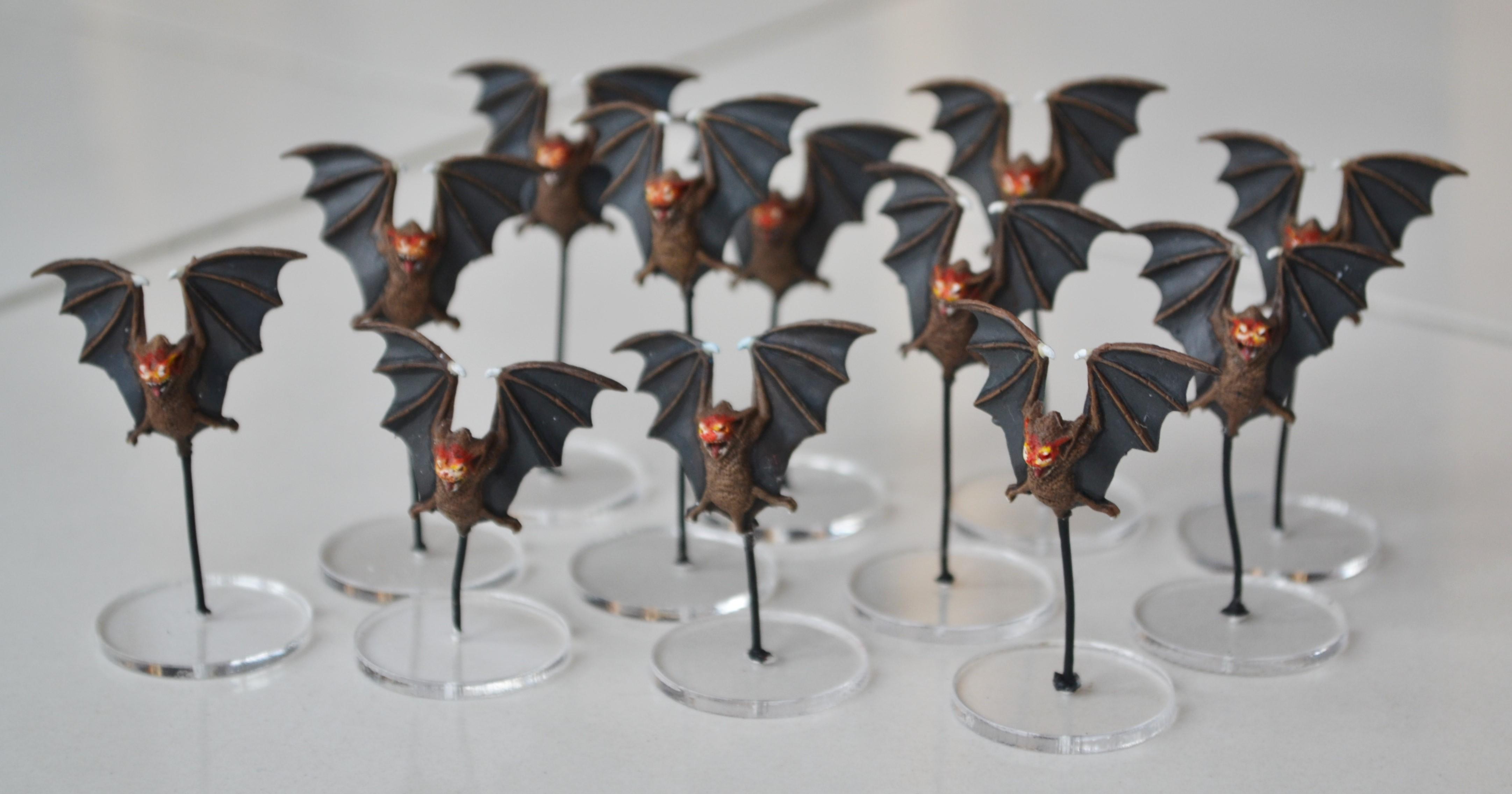 the bats I painted now on wire and clear bases