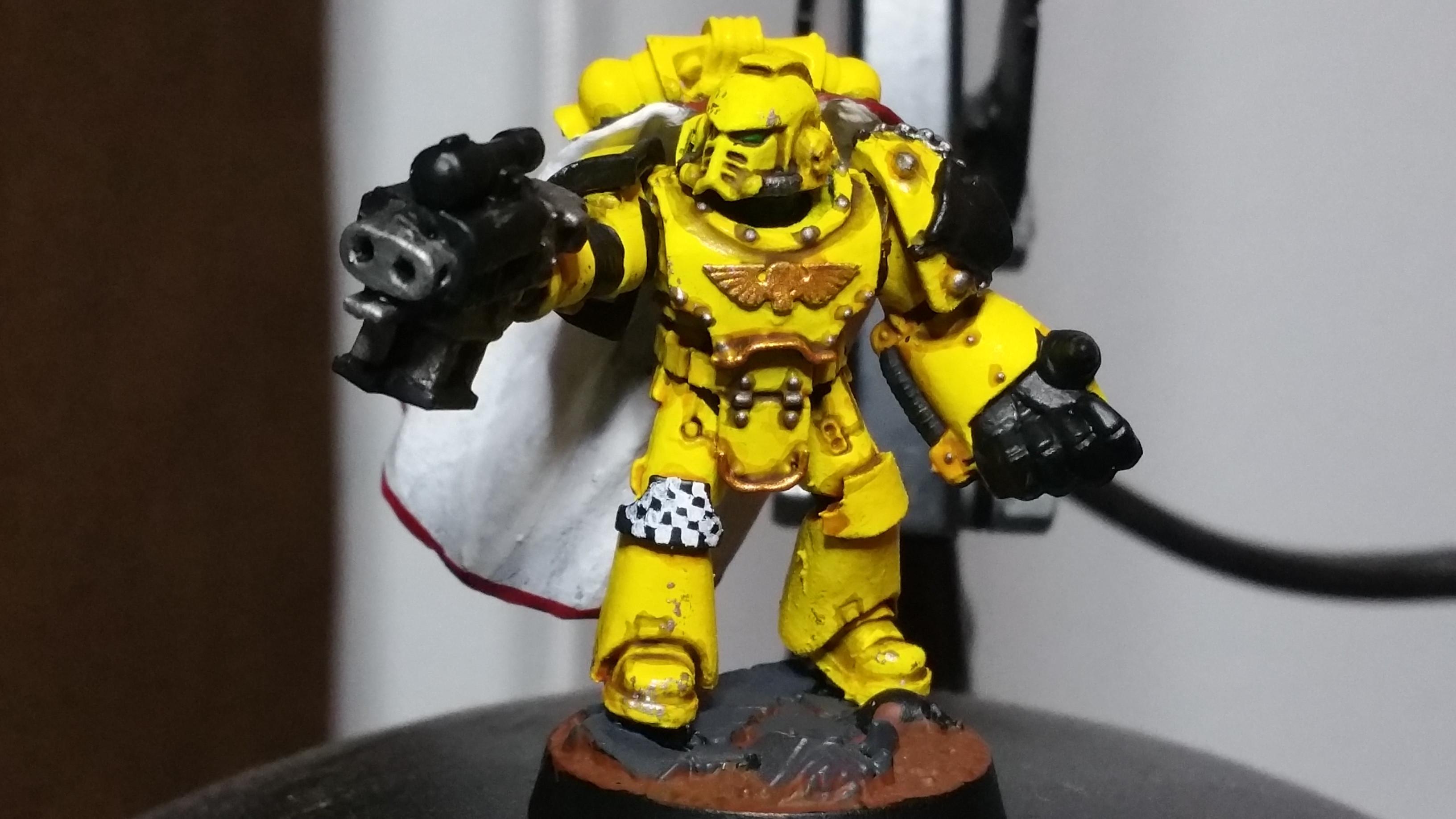 This was my IF captain when they are a chapter, but I have a feeling his arms are going to get removed and a new loadout soon enough to lead his legion brothers