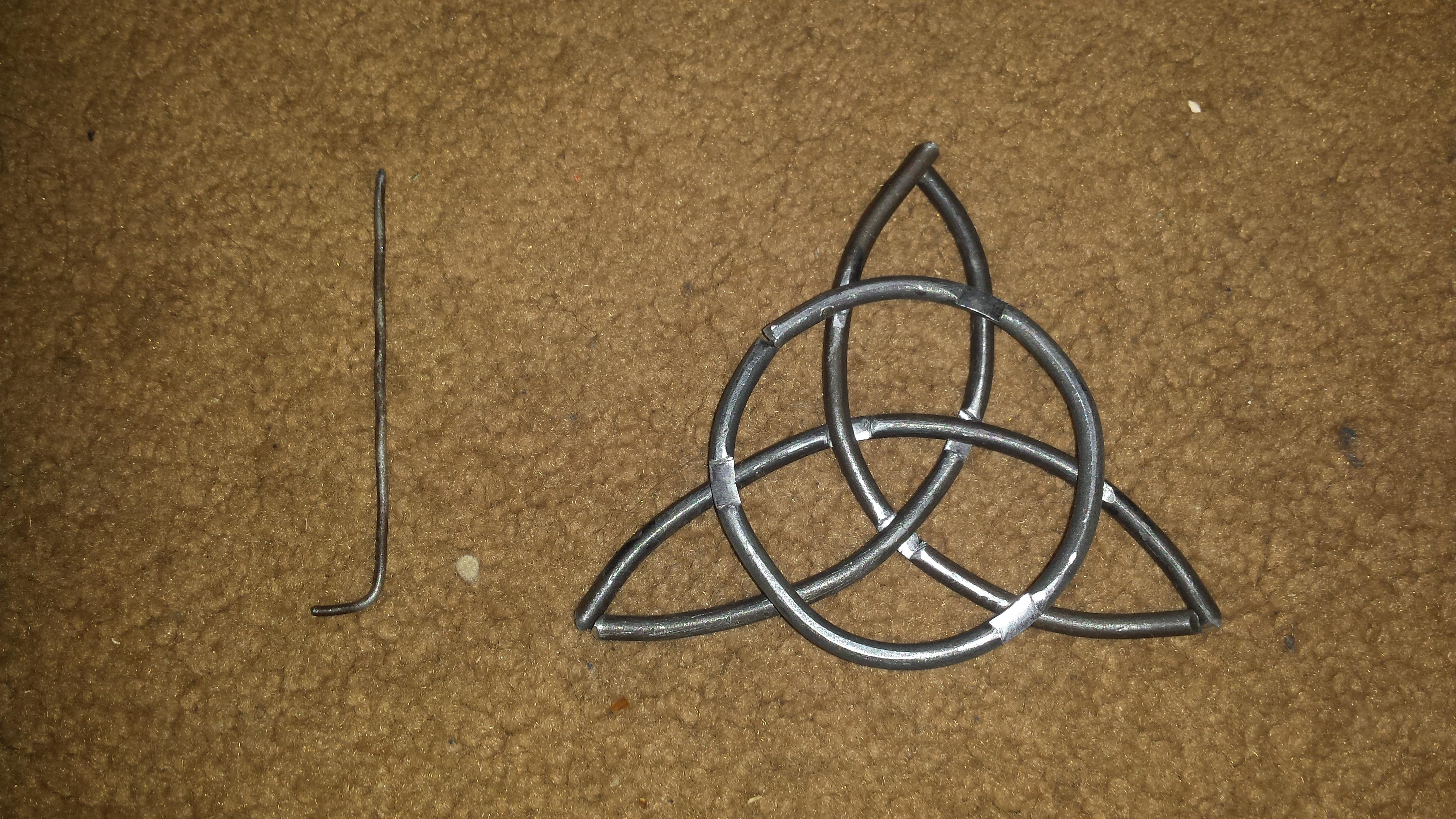 celtic knot pin commission for my supervisor at work. I have a new job, now: I work at a warehouse for concrete forms. This will be bronze when I am done