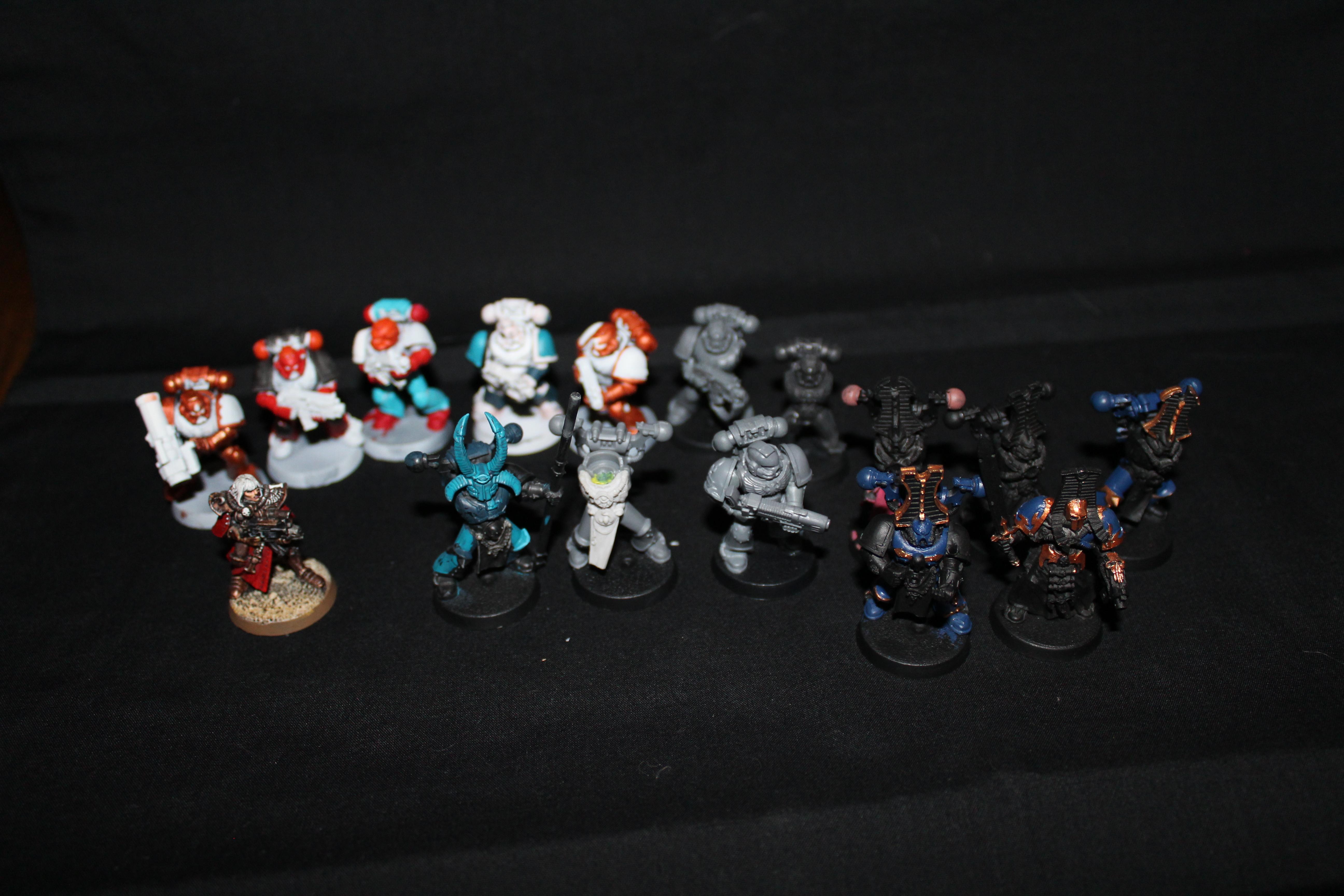 random assortment of space marines and a few resin thousand sons chaos marines + sorcerer