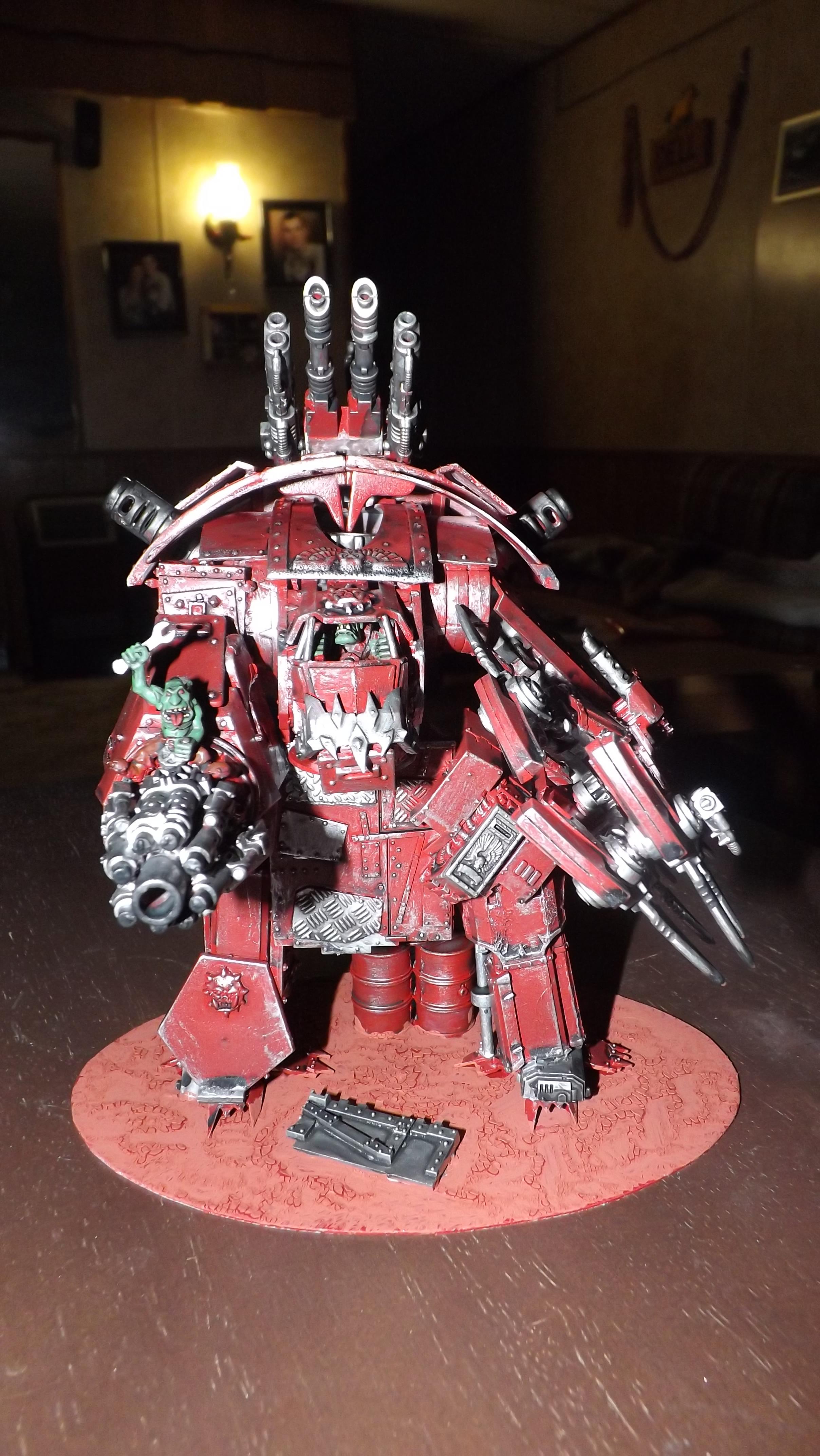 The War Boss was able to get his Big Mek to build an Ork Knight after defeating one in battle