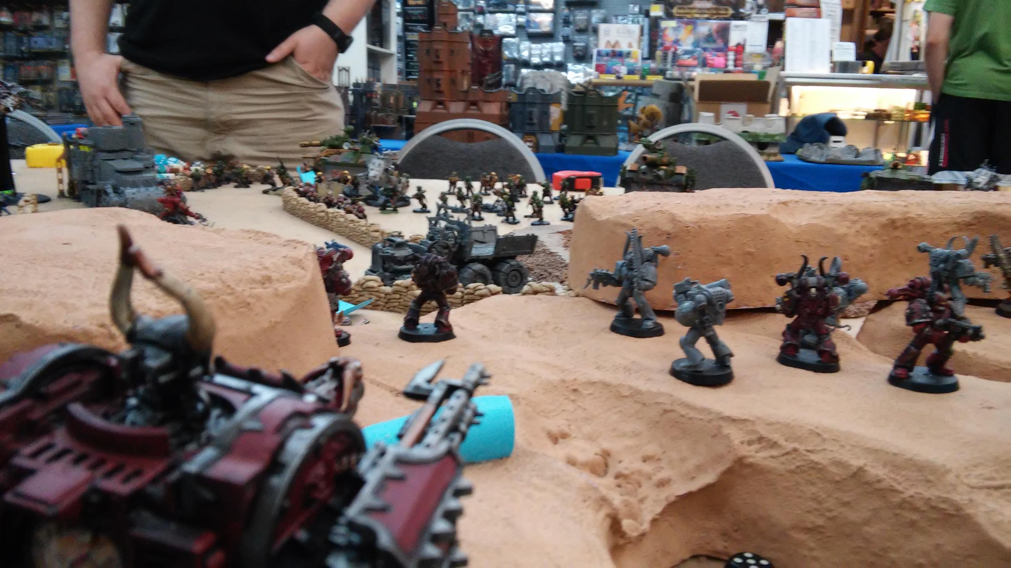 A Chaos Warband holding a ridge overlooking the Imperial Guard
