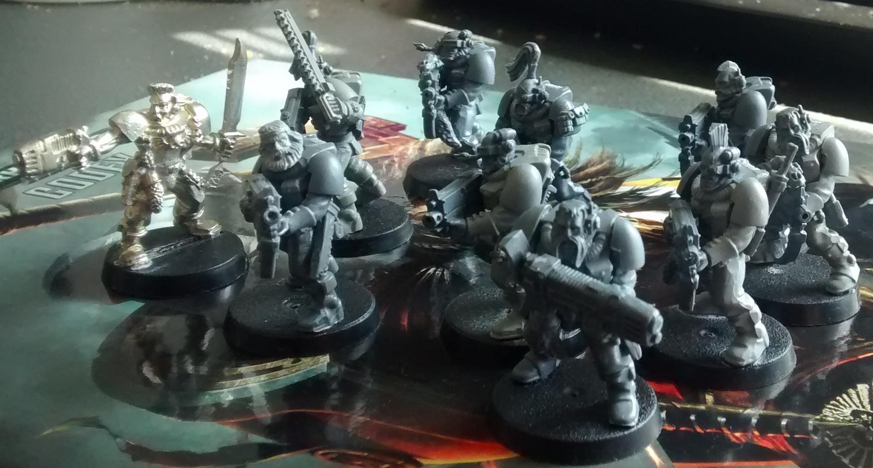 A Wolf Scout pack with bolters