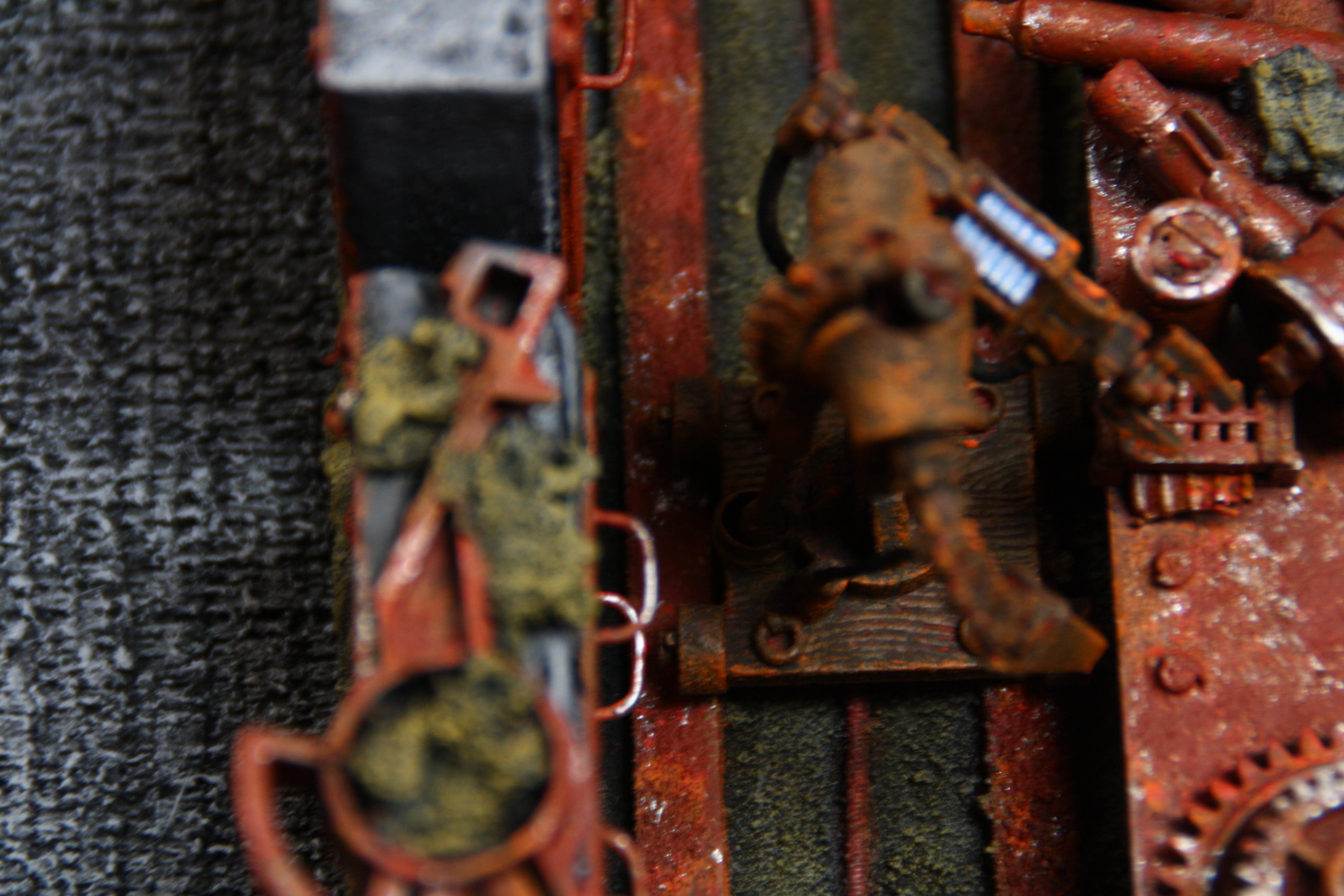 note the robo-worker moves on rails