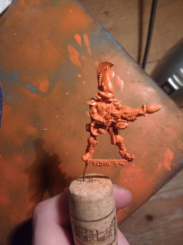 Airbrushed model, the watery look is still there when its dried like the photo, its really thick on the model, while still being quite translucent to the white spraypaint underneath