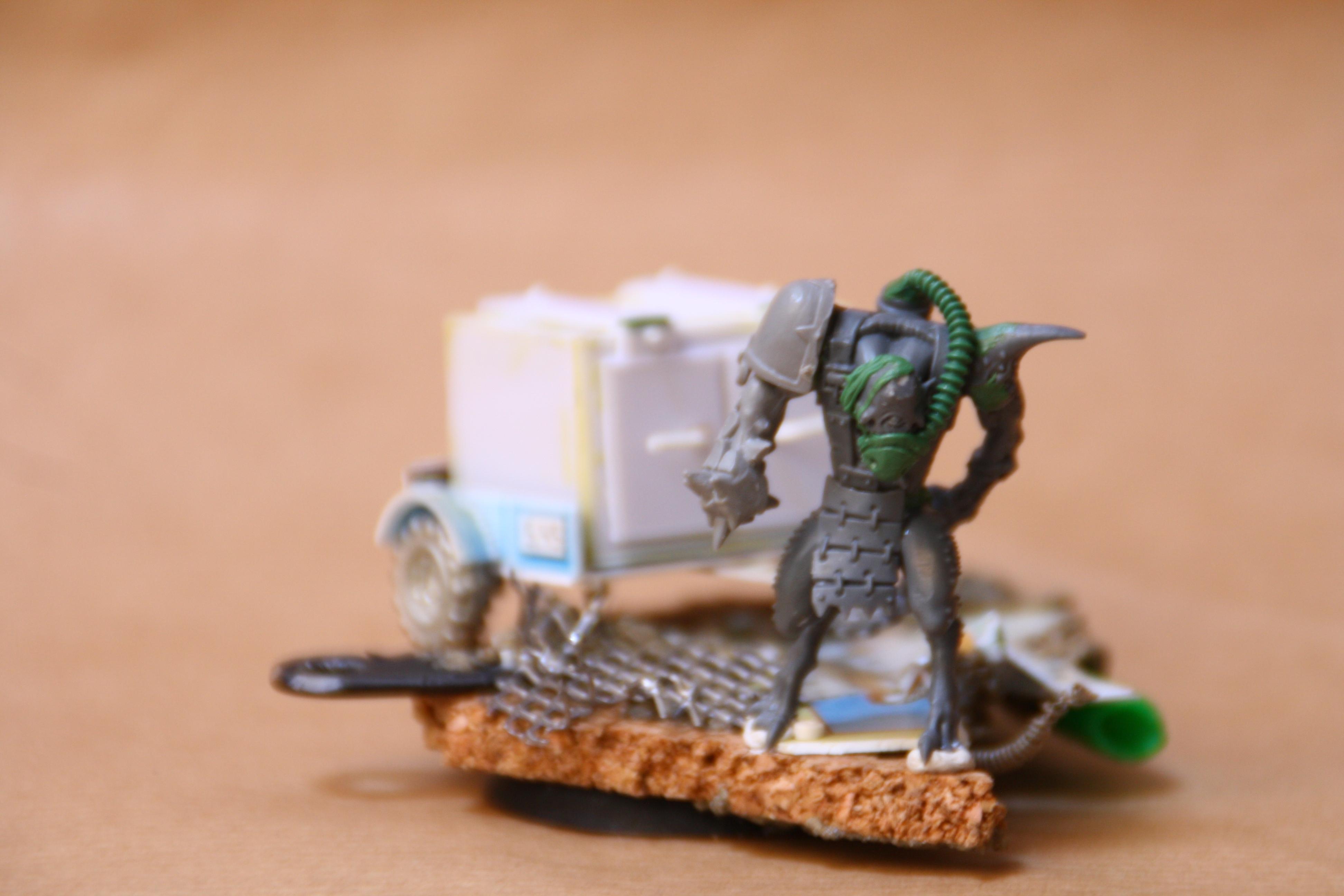 Part of his retinue will bw this alien carrying a safe