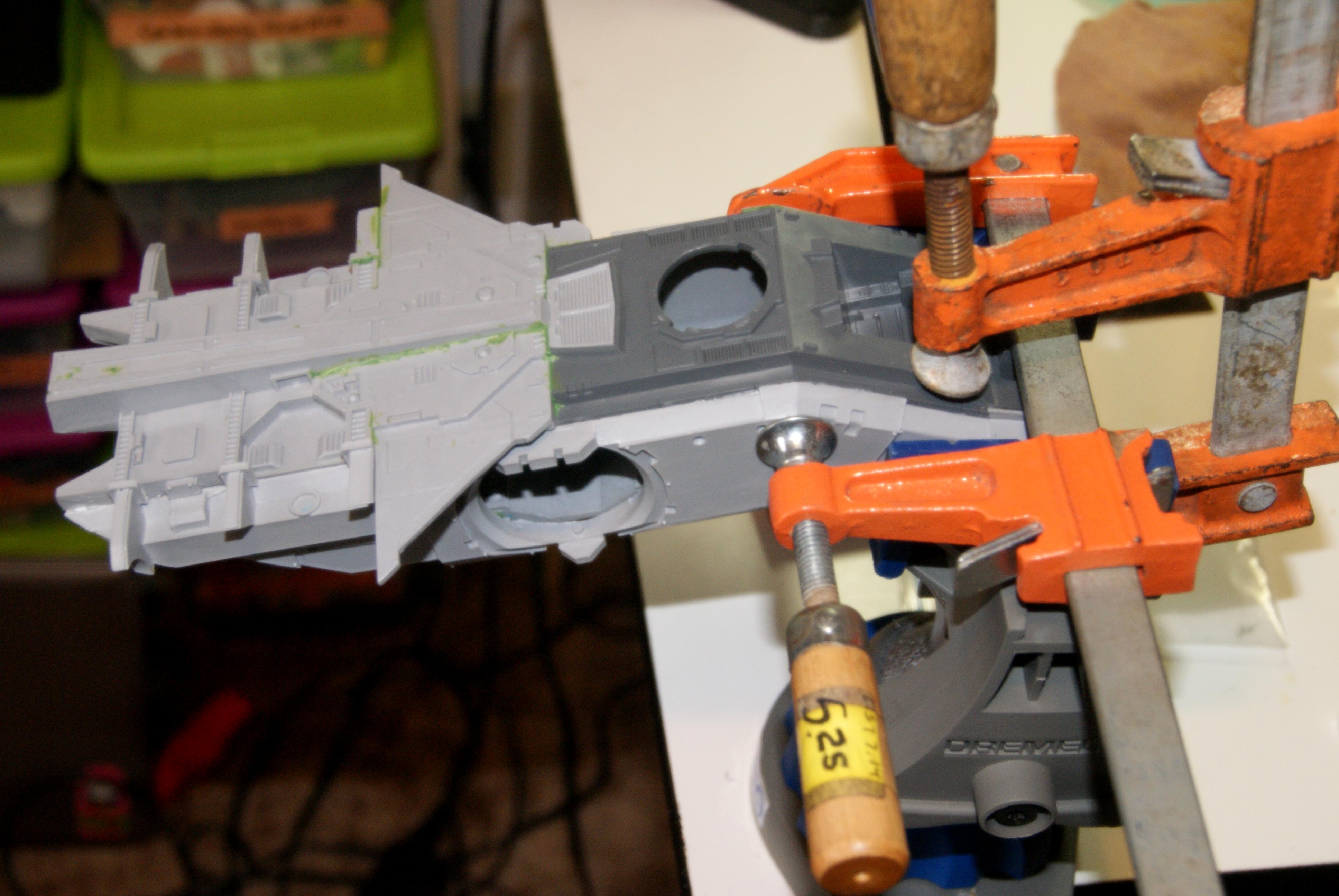 Clamping in top of port side. 