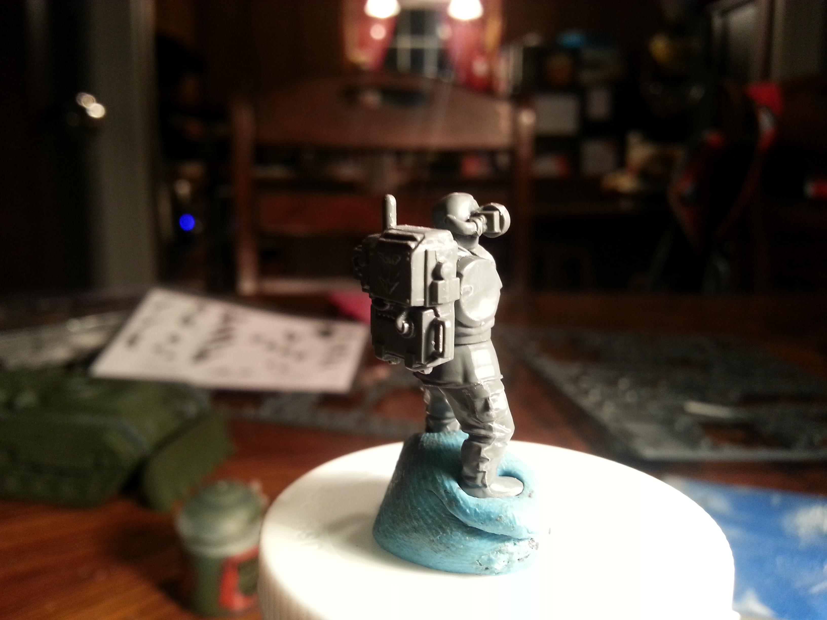 i glued the wire, witch was connecting the speaker to the backpack, to the lens and the back of the head