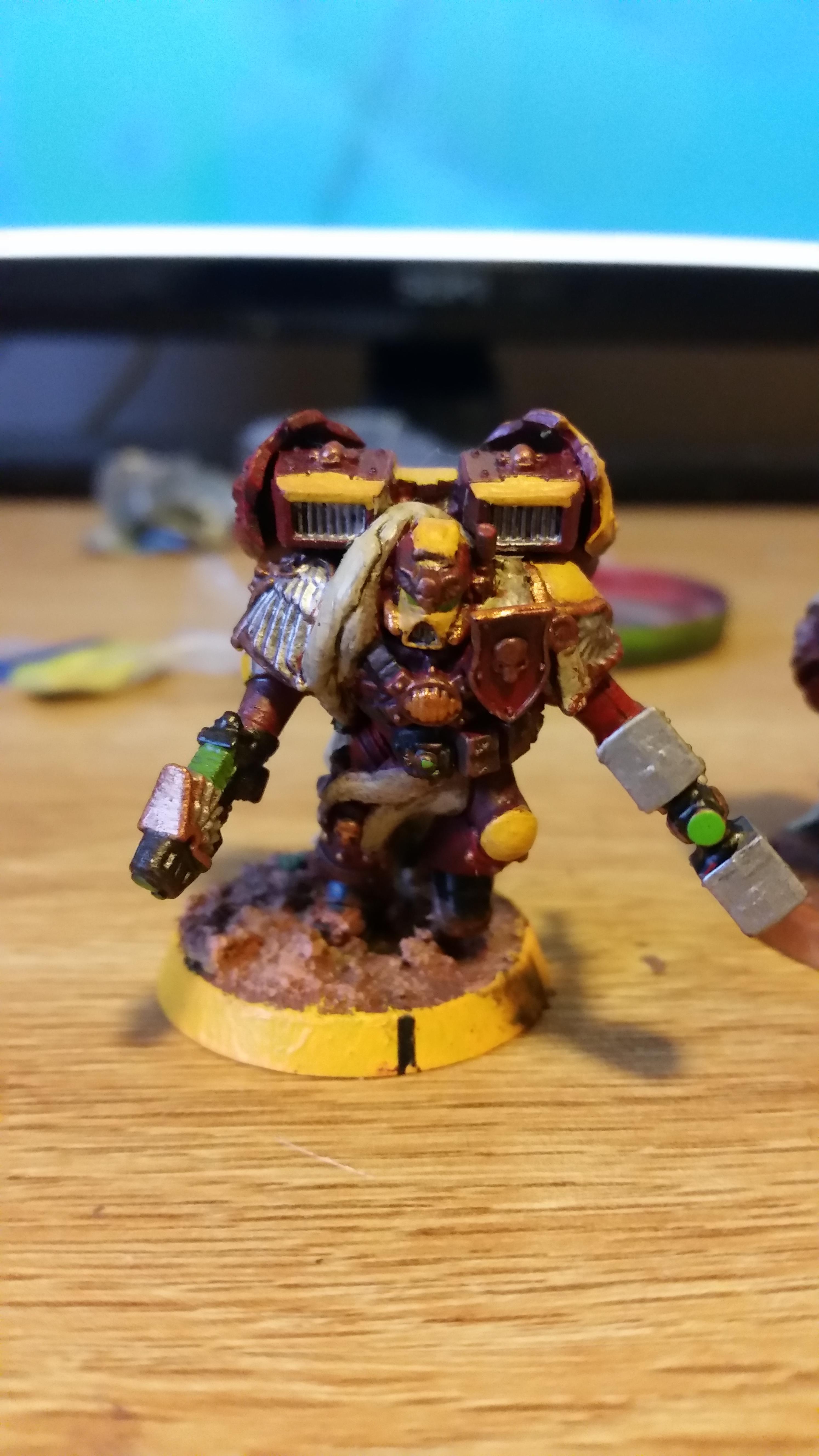My first Assault Squad Sgt. Probably going to modify the weapons he has