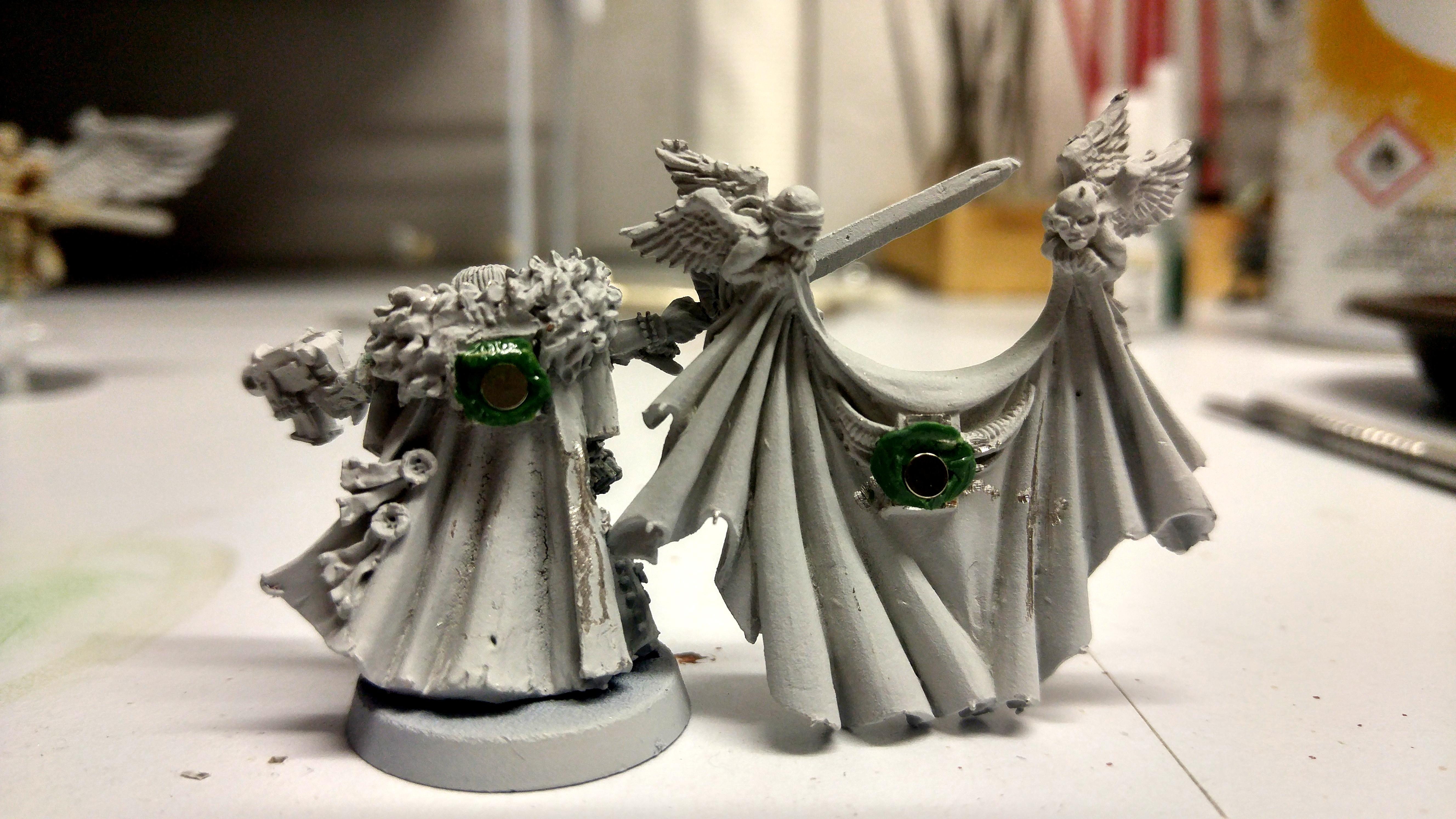 Canoness with magnetized cape