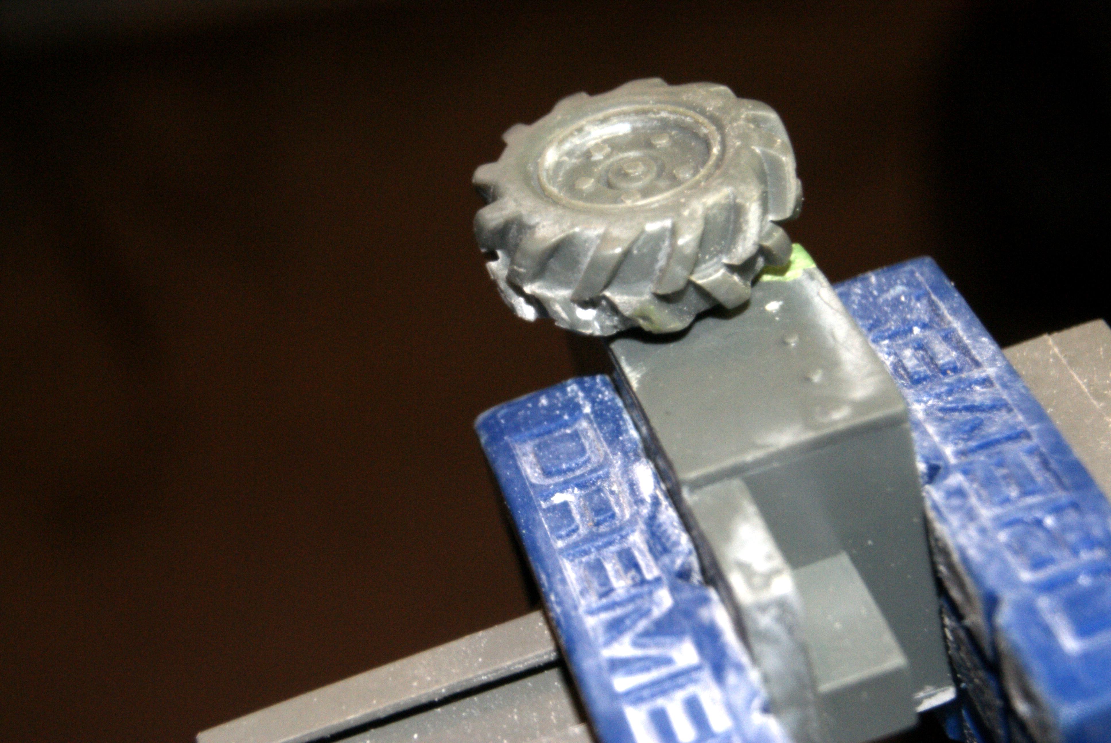 Glue on a wheel. 