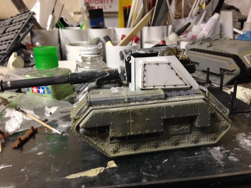 Added some side armor to bulk it up, but packed the rivets too close together... 