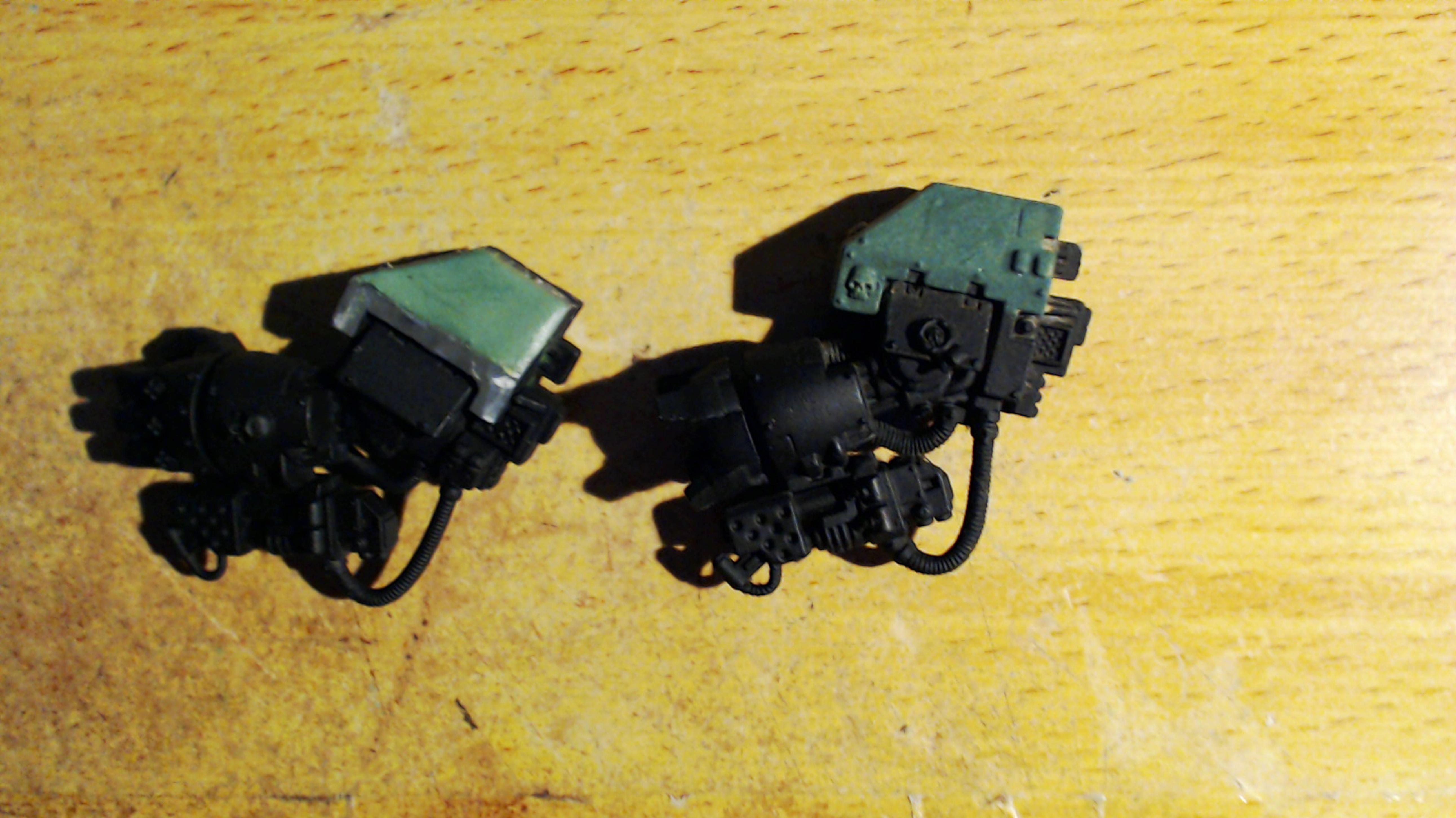 Dreadnought Arms - Green Stuff Repair, Solid on Left Liquid on Right