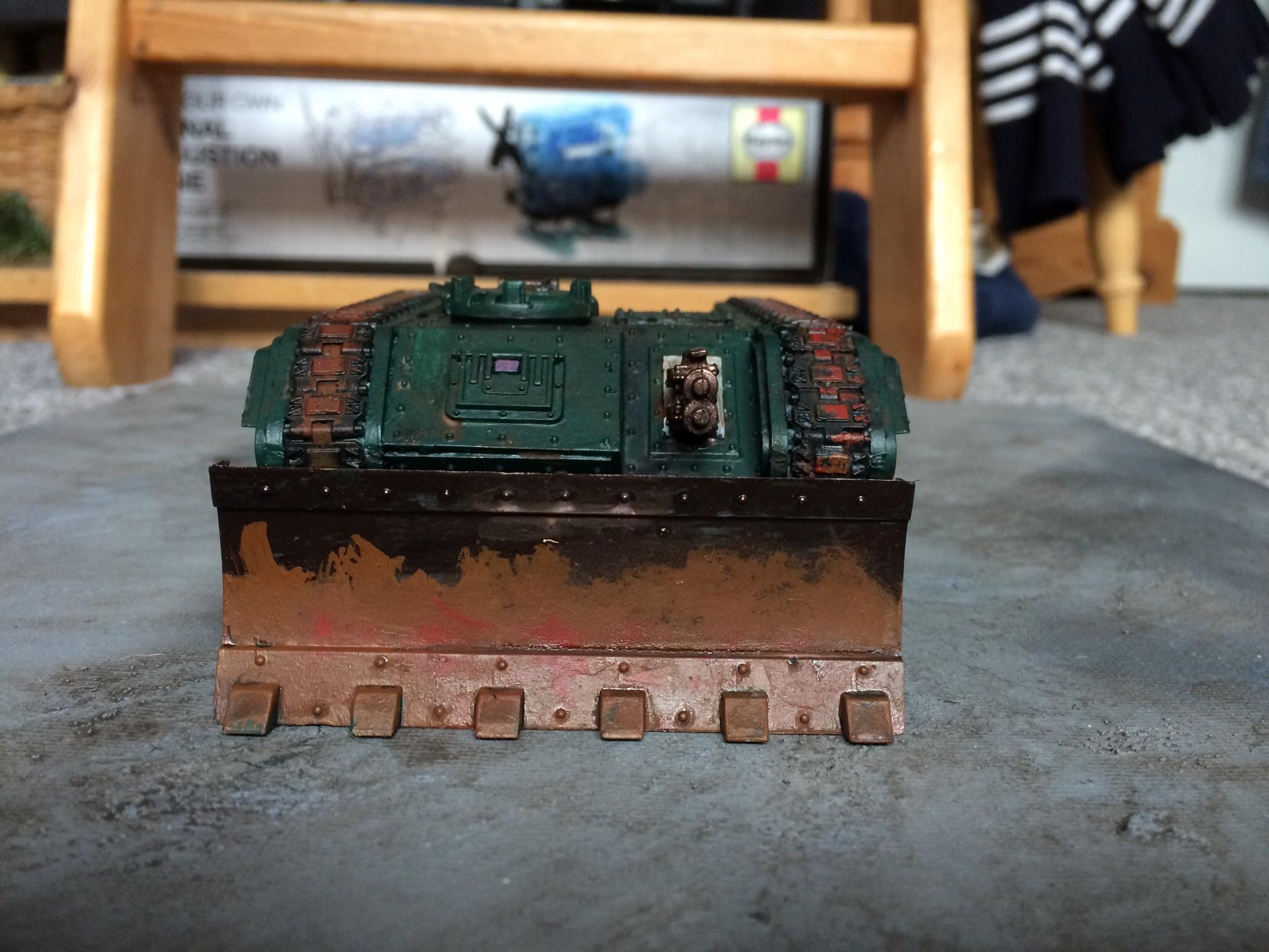 I've added a dozer blade to the front as well