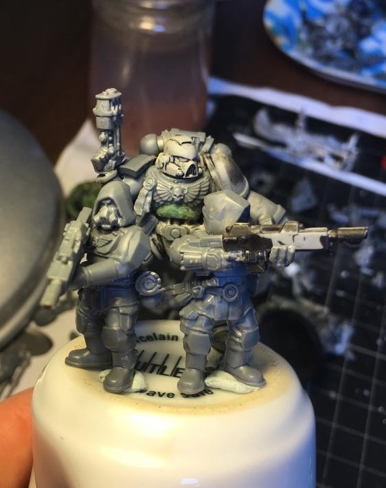 The true scale marine is head and shoulders taller than his allies
