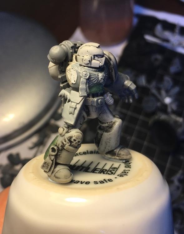 I removed the plasma pistol arm from the Space Marine