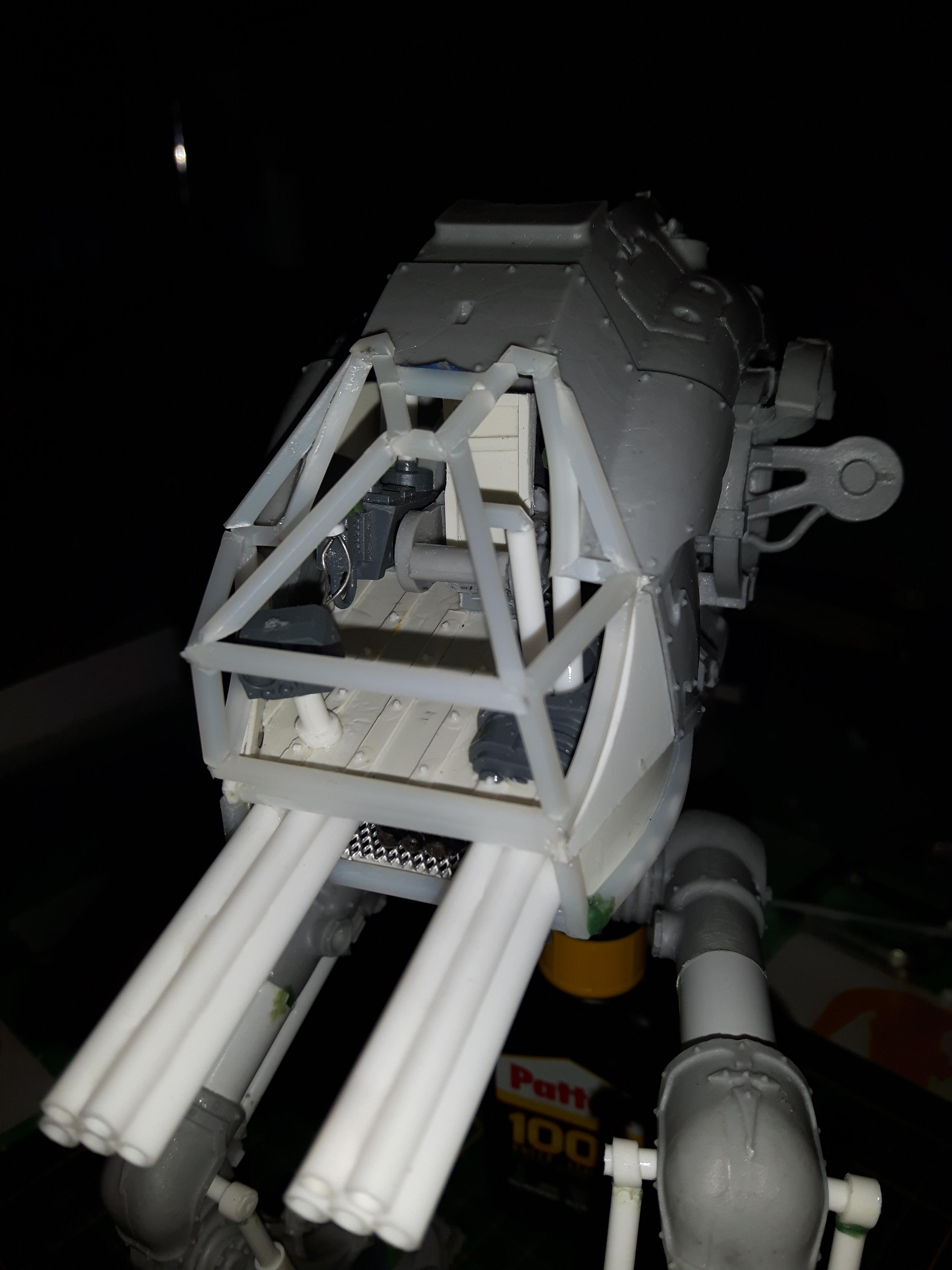 Cockpit including glass frame