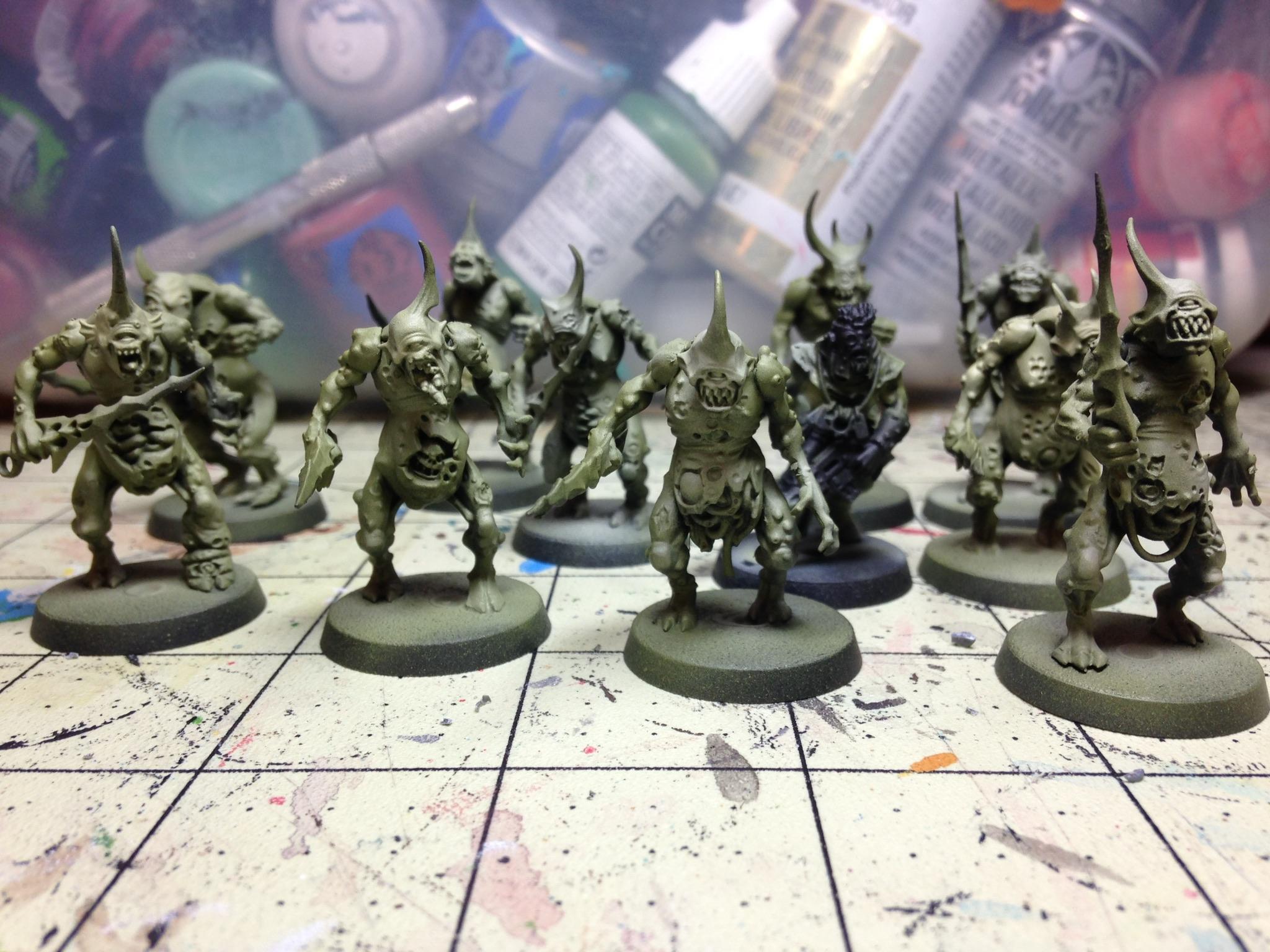  Primed black, then airbrushed dark green, to Nurgle rot.  Spot lighted some Vallejo sand yellow