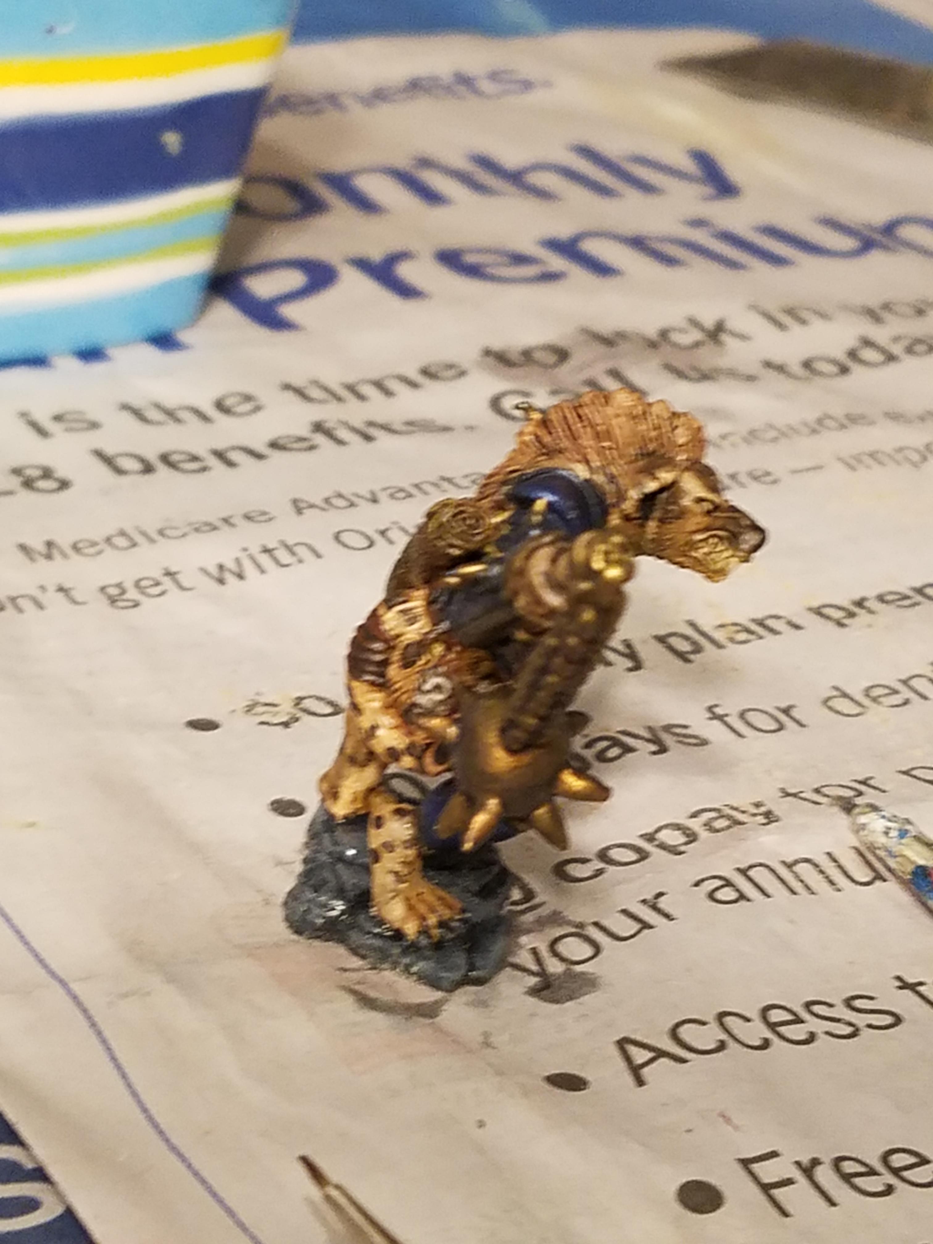 Blue Metallics, Cauliflower Base, Colored Metallics, Gnoll, Hyena, Layered Wash Painting, Mediocrity, Overly Busy Backgrounds, Oversized Flail, Reaper, Stone Themed Base, True Metallic Metals