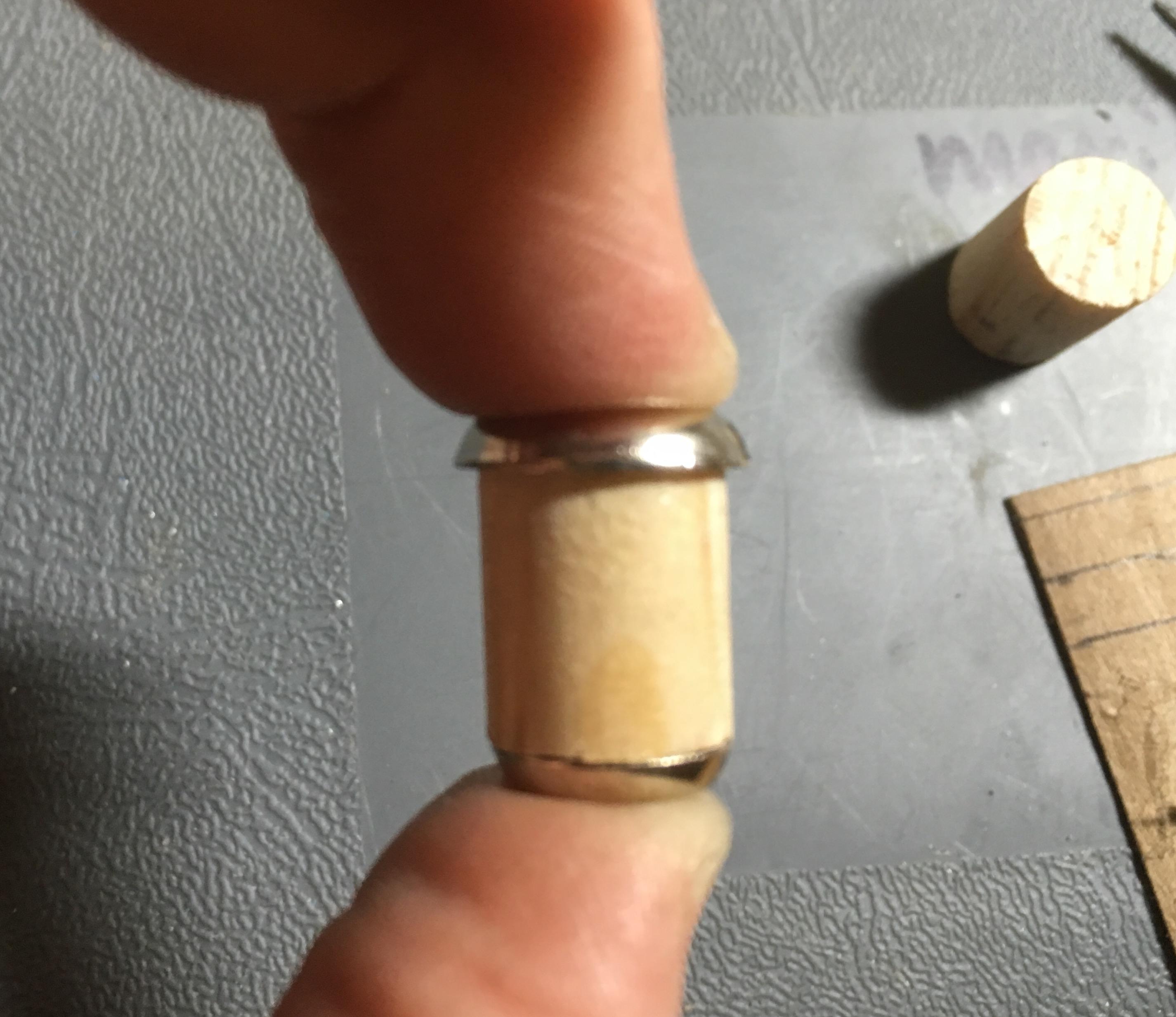 Beveled washers fit wooden dowel for DIY heavy jump packs