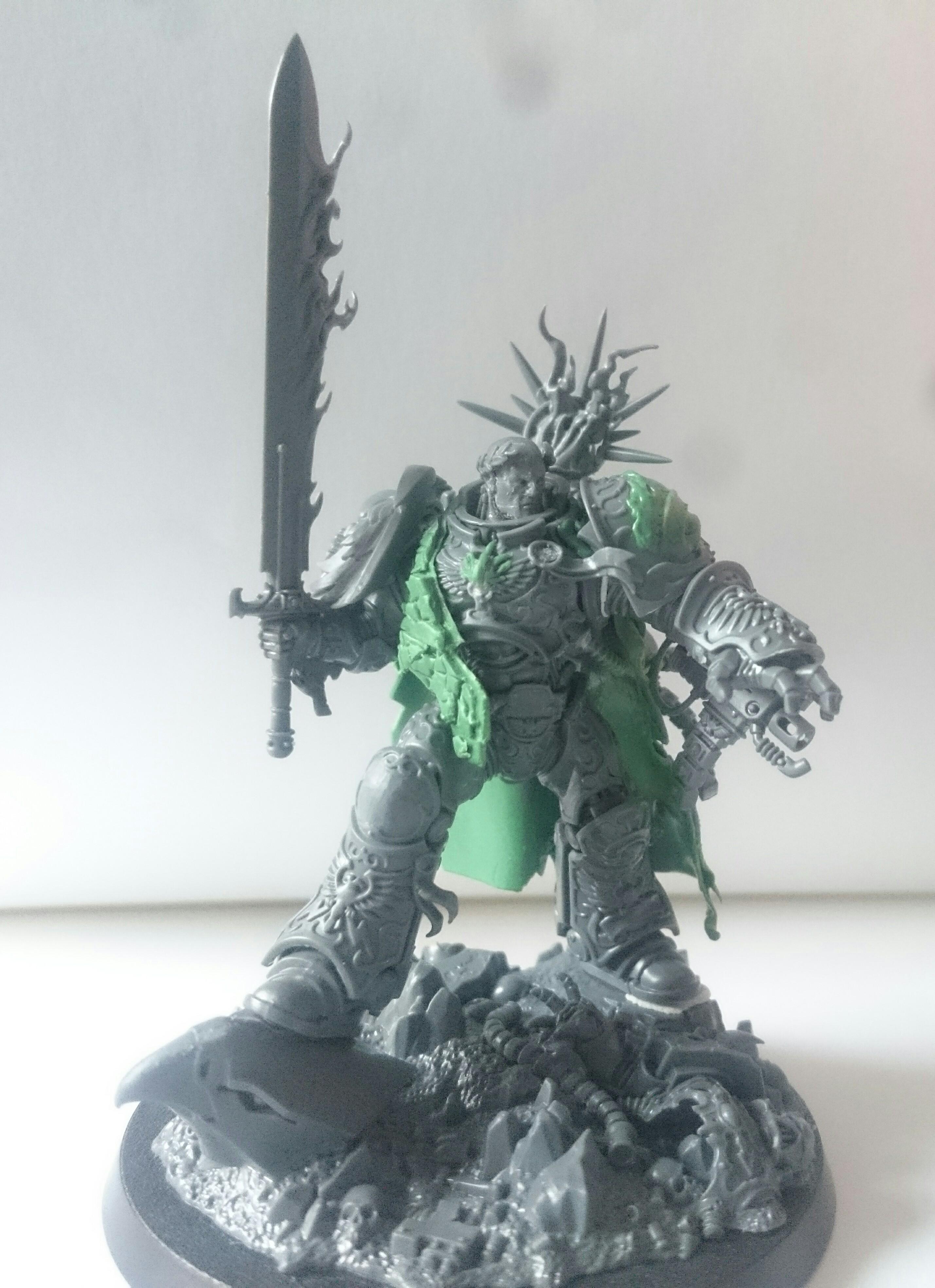 I then added a drakescale cloak made from greenstuff and shaved off a few details such as the symbol on the knee pad, the number 13 on the belt and the purity seal on his chest plate