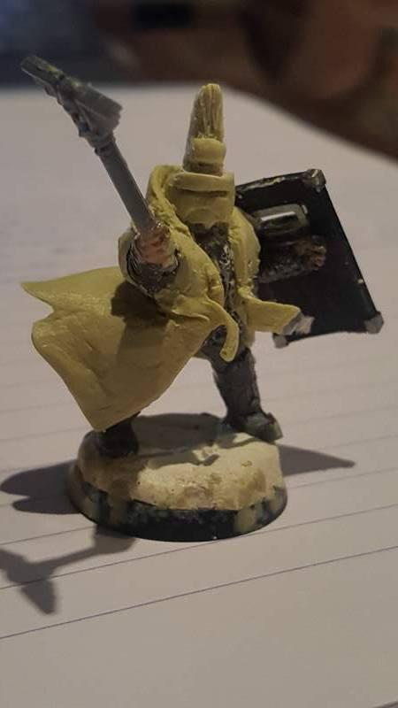 Arbites Magistrate - Company Commander with Staff of office (Power Maul). Based on a Scions body, and heavy miliput-ted